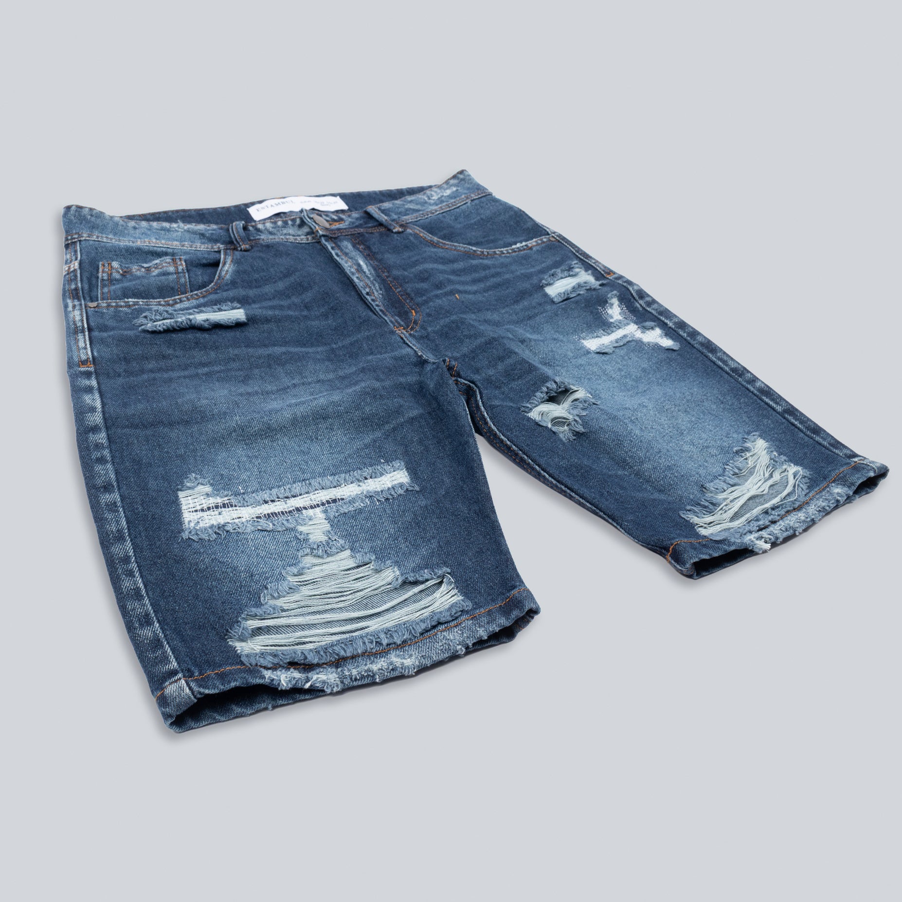 Bermuda hombre con rotos