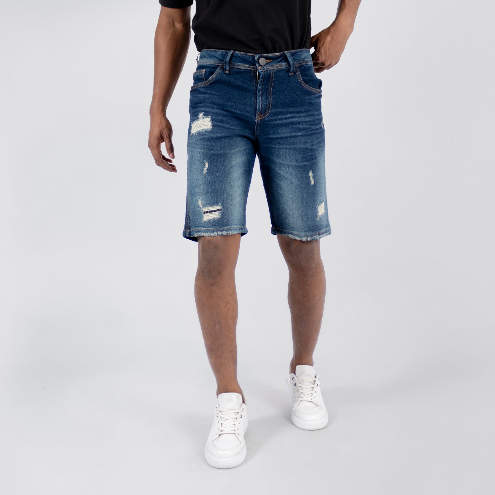 Bermuda hombre con rotos y parches