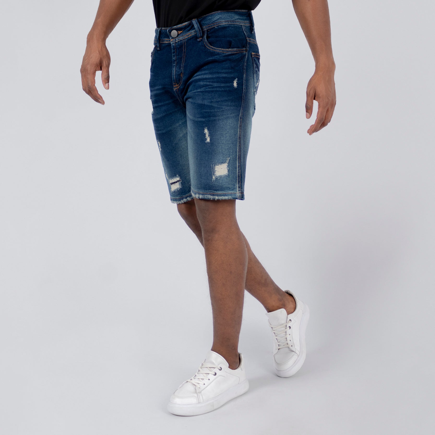 Bermuda hombre con rotos y parches