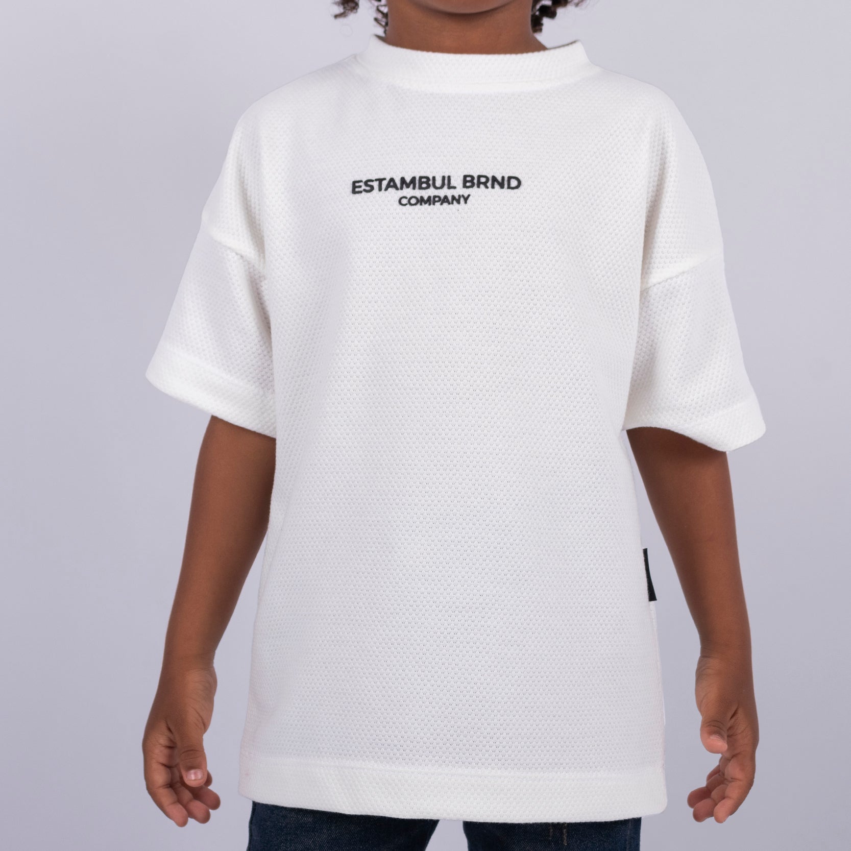 Oversize niño Textura Marfil