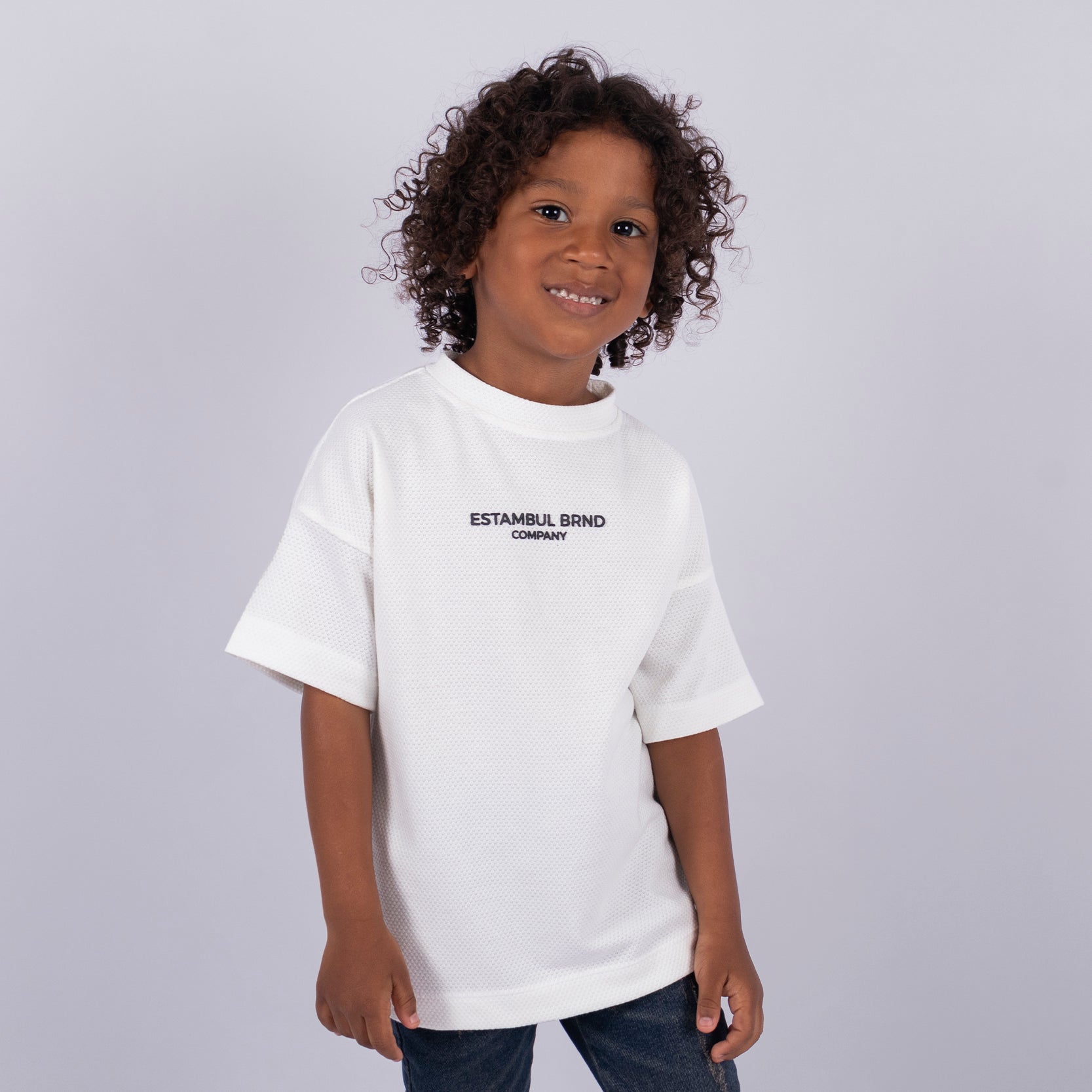 Oversize niño Textura Marfil