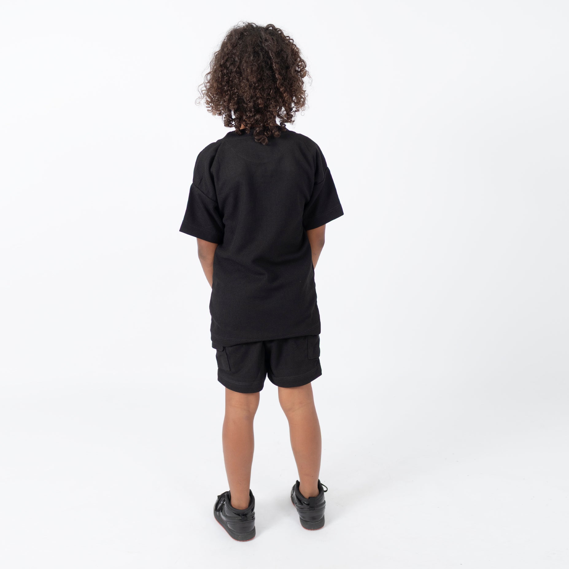 Conjunto niño textura negro