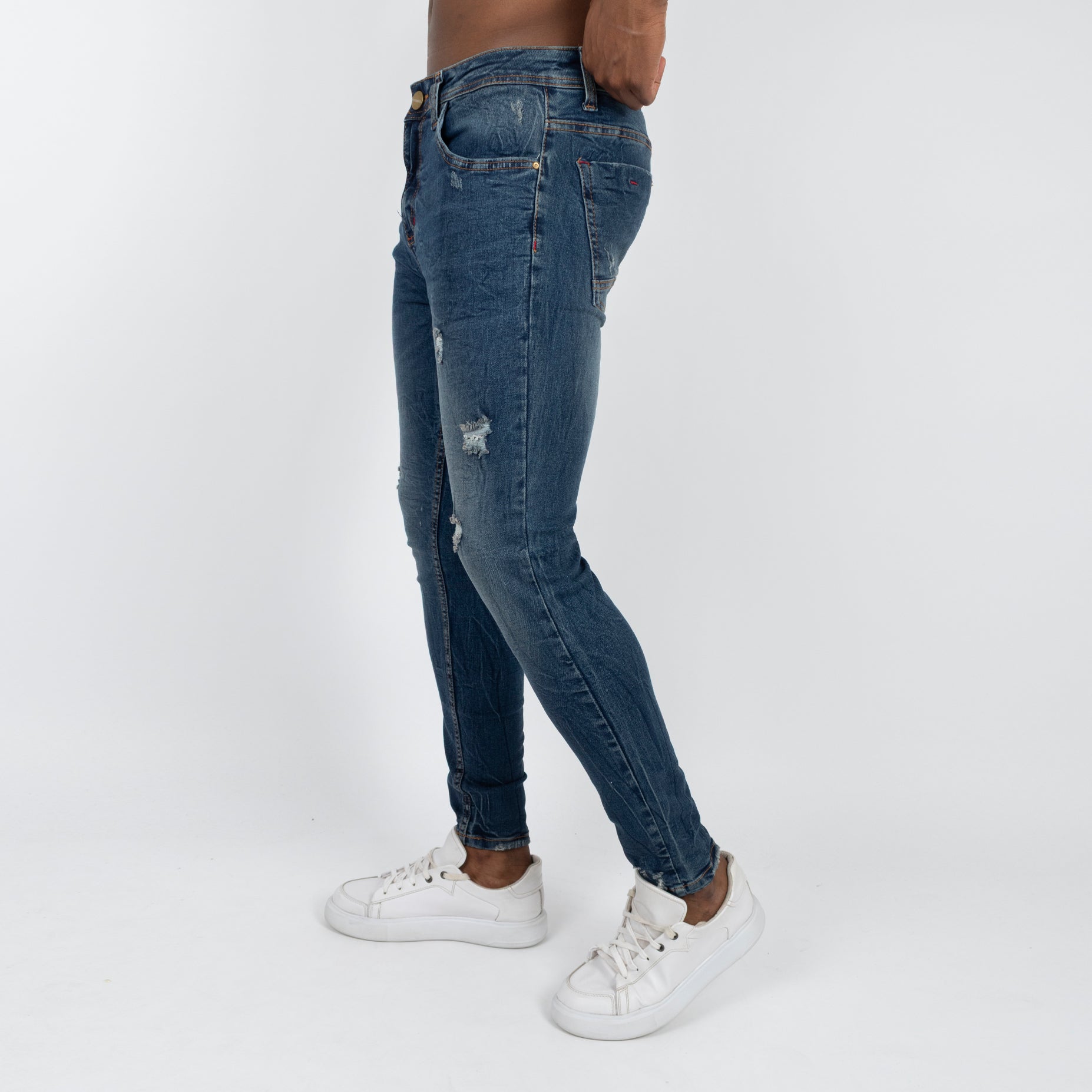 Jean hombre skinny azul con desgaste y rotos