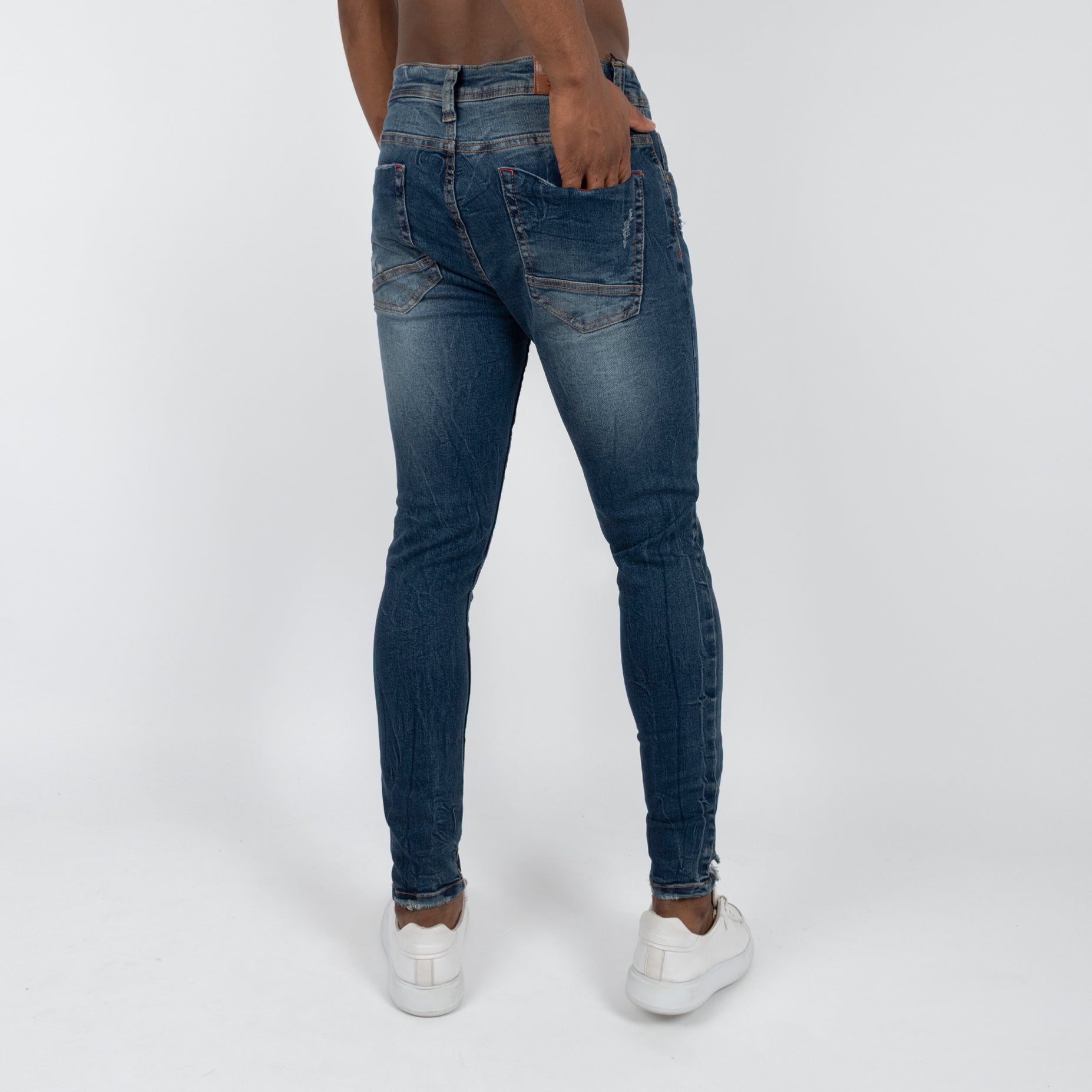 Jean hombre skinny azul con desgaste y rotos