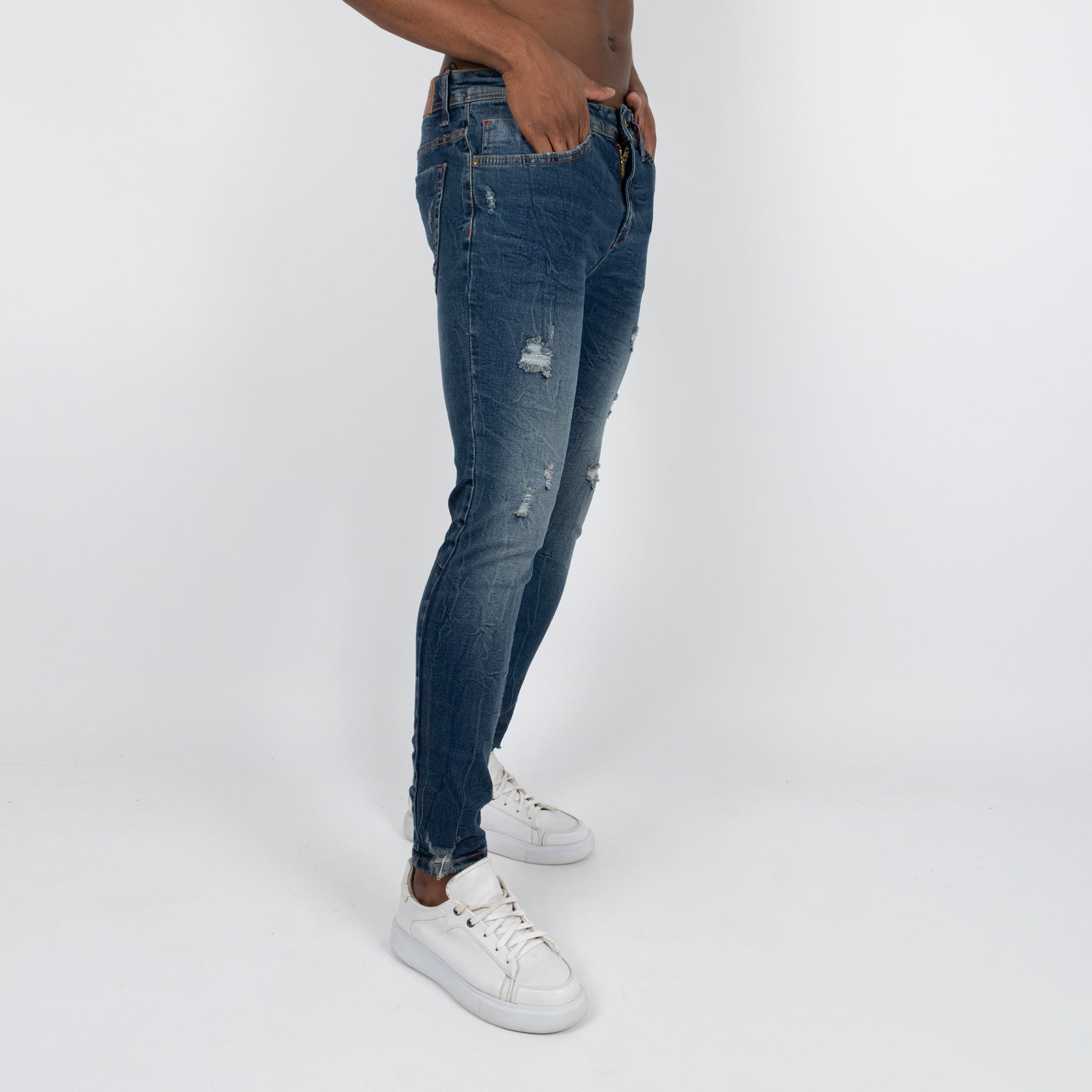 Jean hombre skinny azul con desgaste y rotos