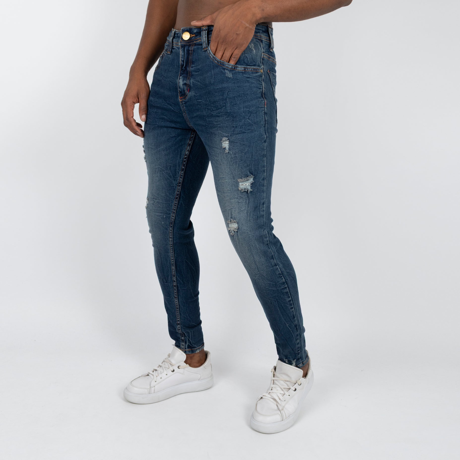 Jean hombre skinny azul con desgaste y rotos