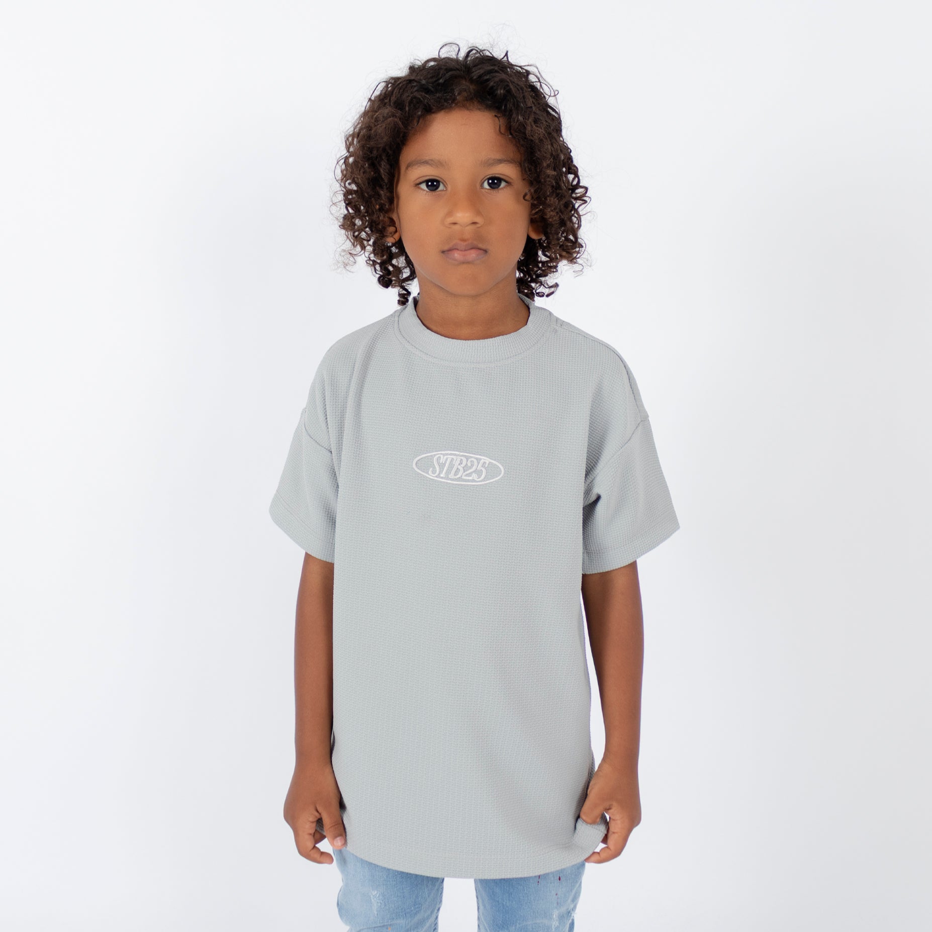 Oversize niño textura gris