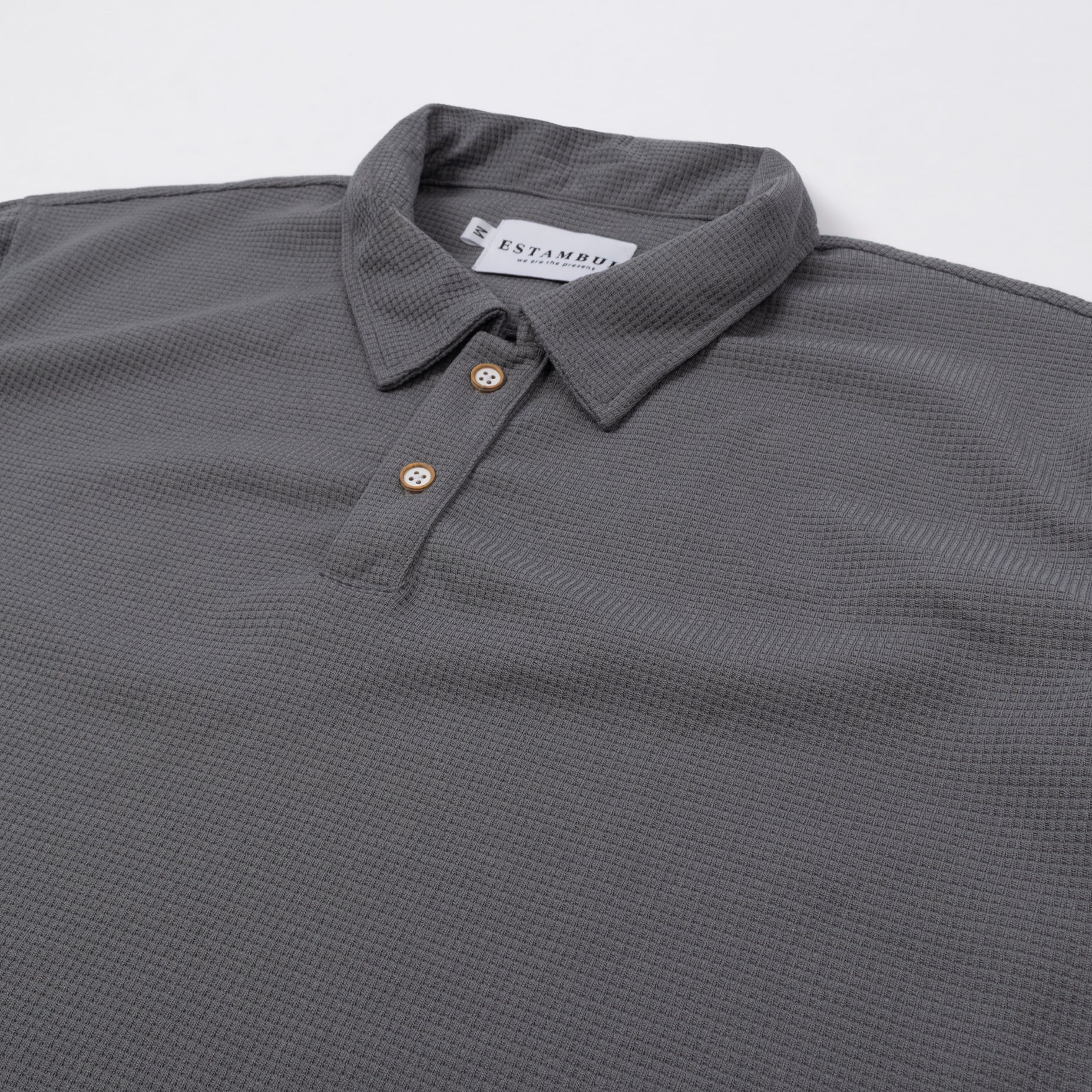 Polo hombre textura gris