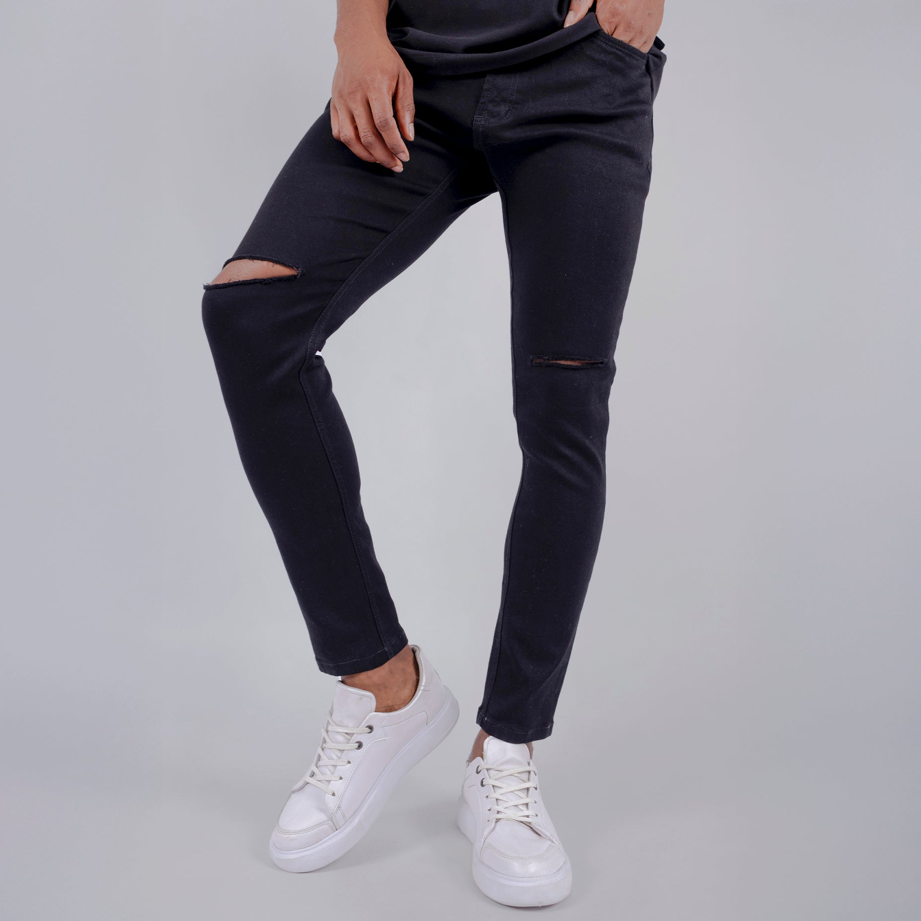 Jean hombre skinny negro roto rodilla