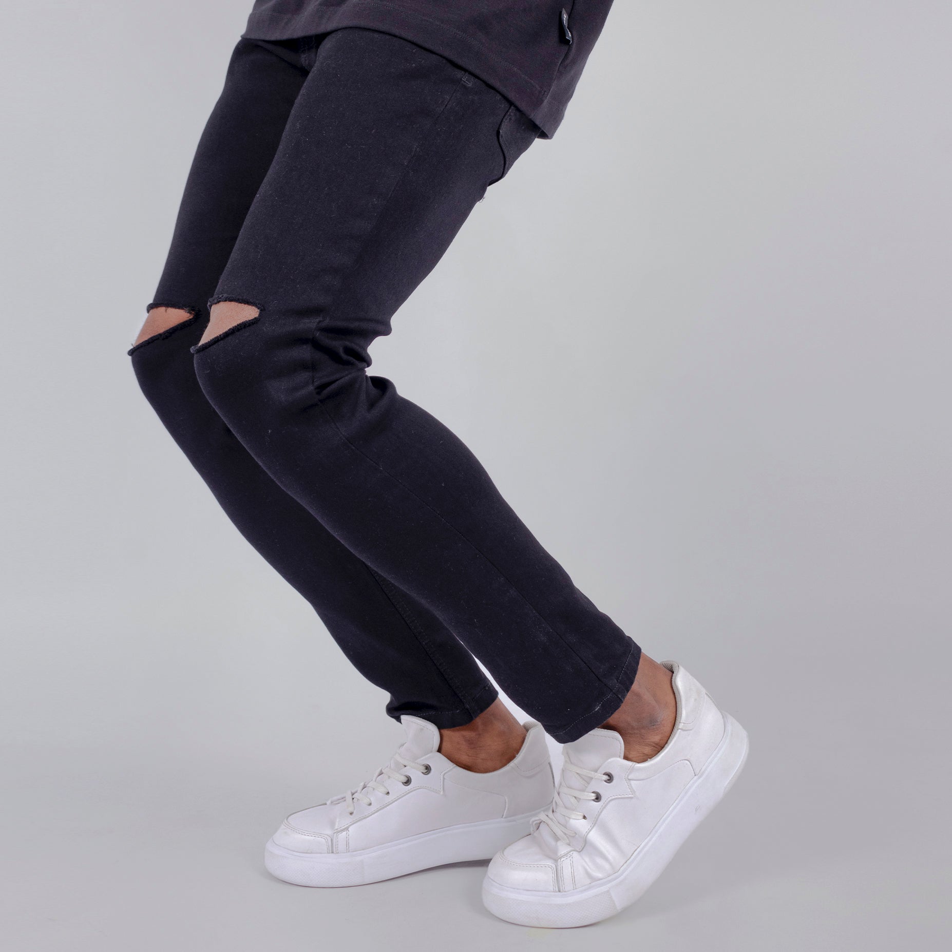 Jean hombre skinny negro roto rodilla