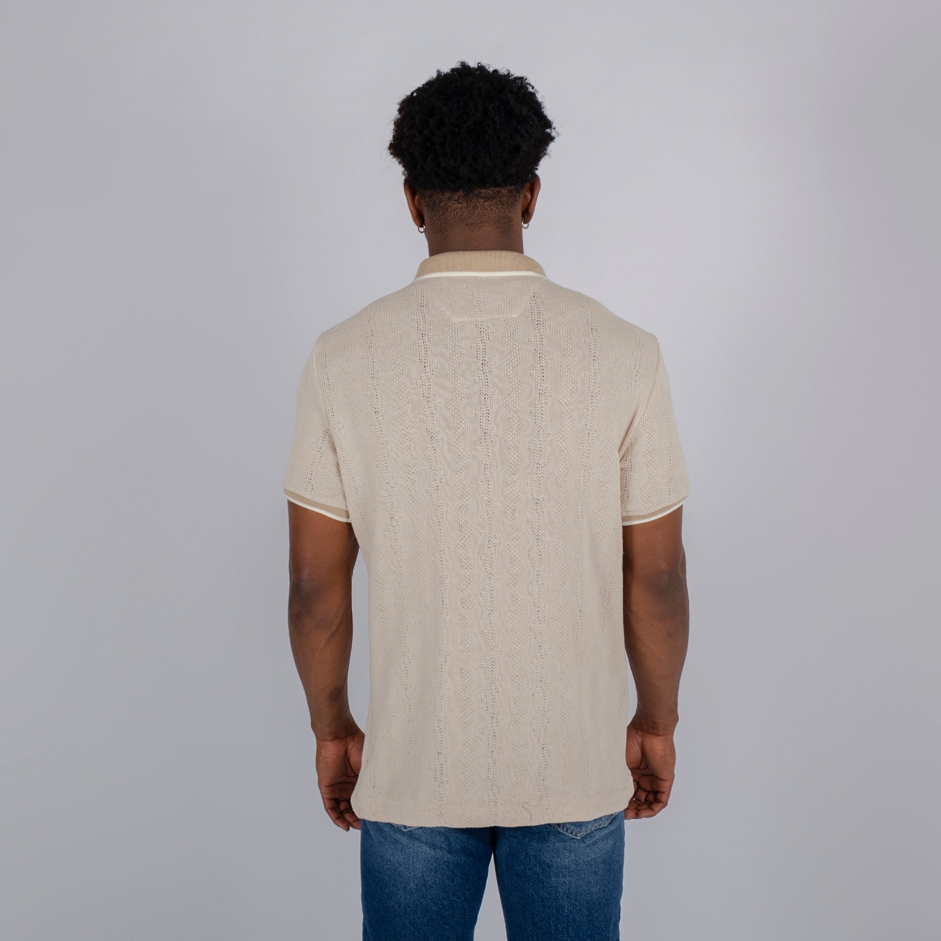 Polo hombre cierre textura