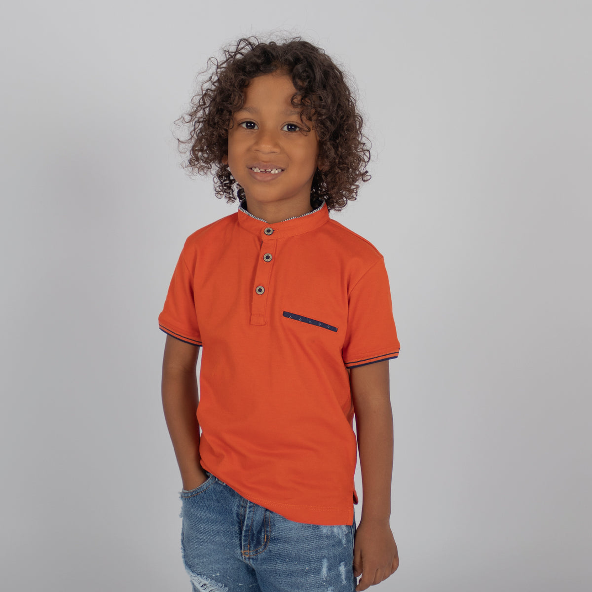 Polo niño basico naranja