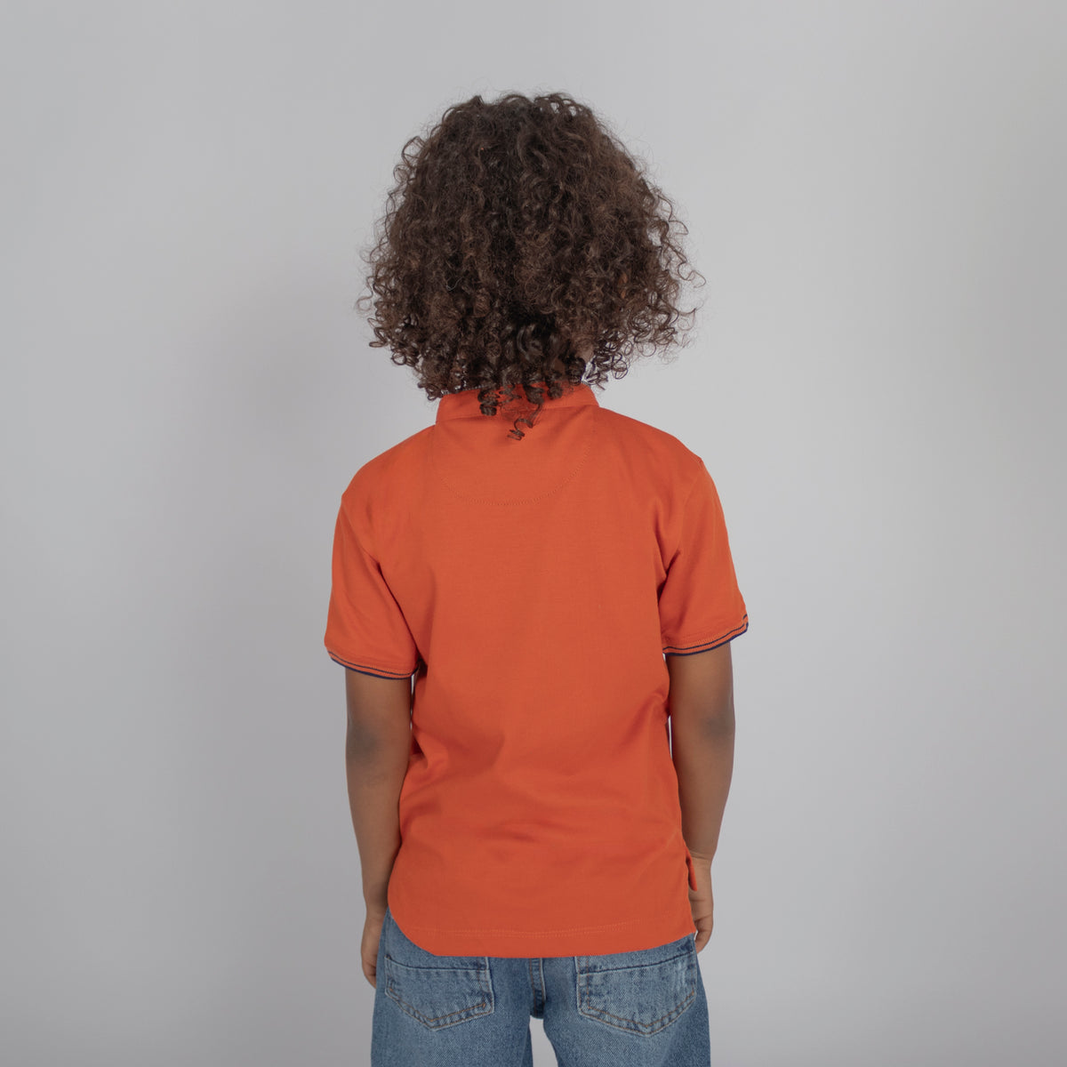 Polo niño basico naranja