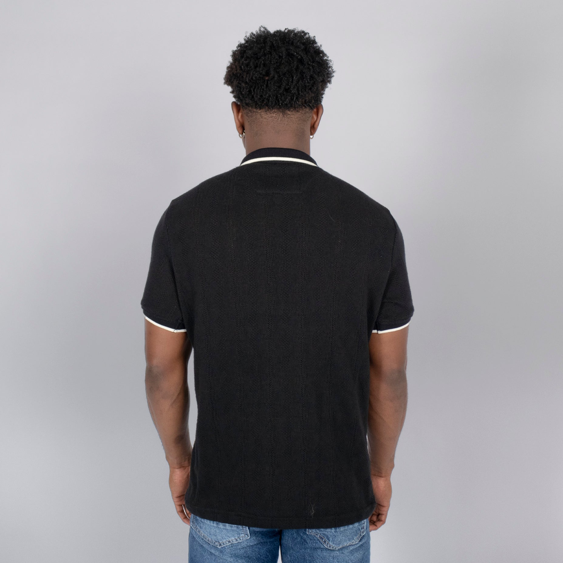 Polo hombre cierre textura