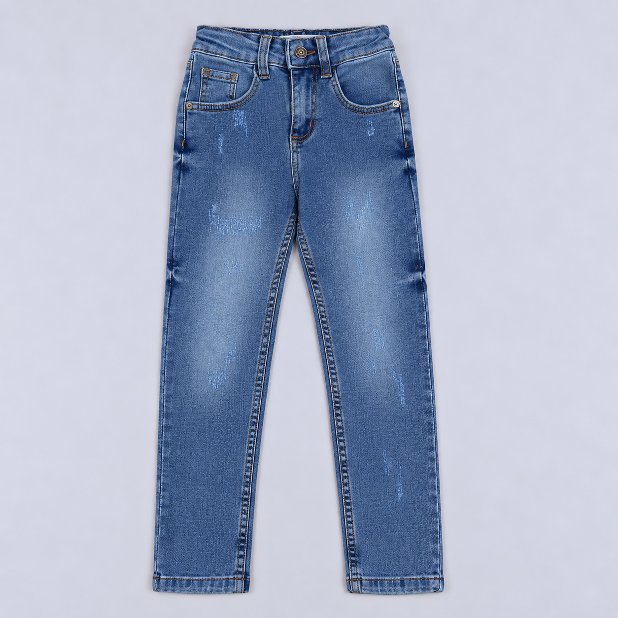 Jean niño skinny claro con rasguños