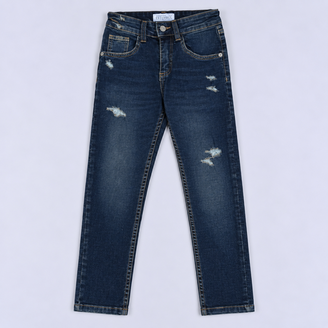 Jean niño skinny oscuro con desgaste