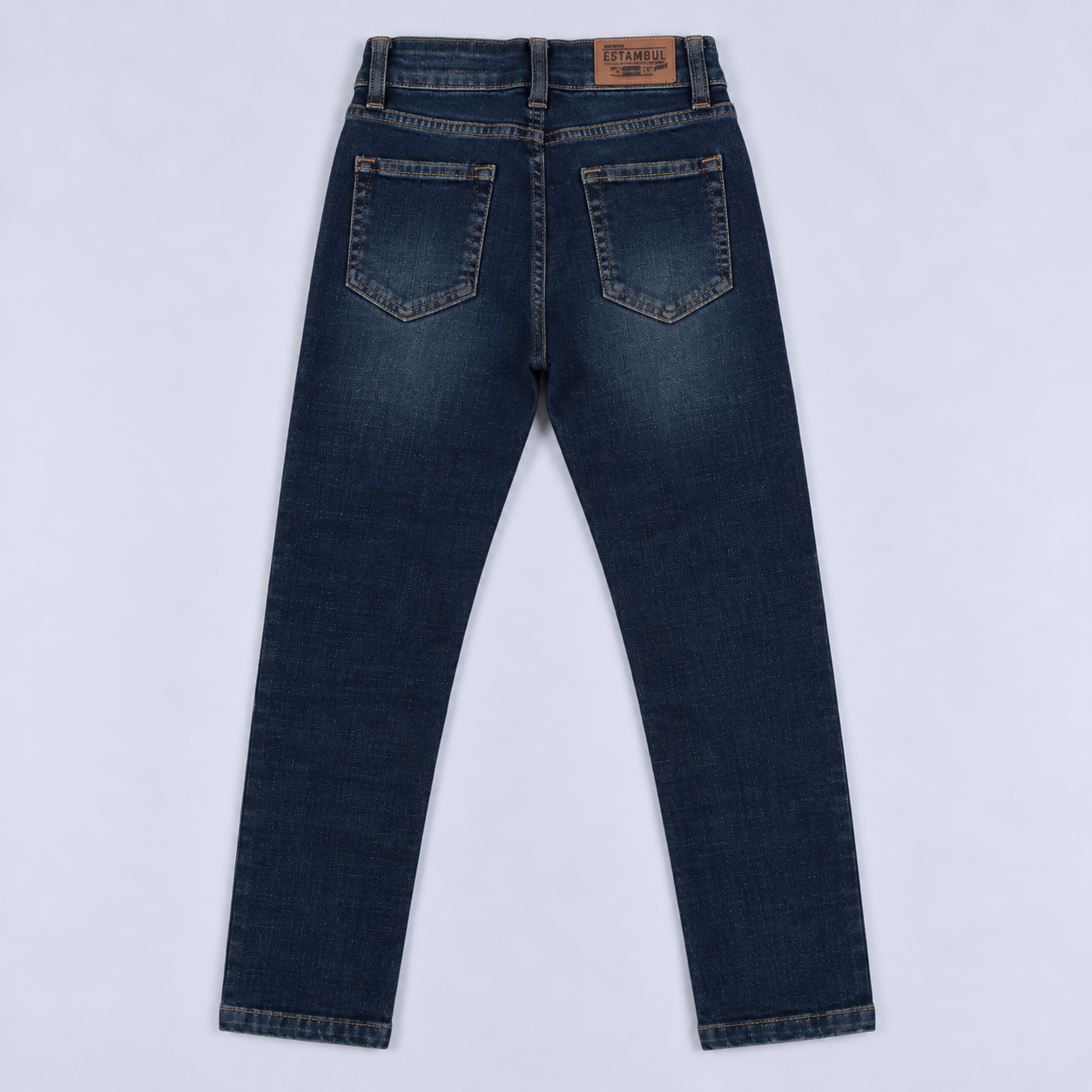 Jean niño skinny oscuro con desgaste
