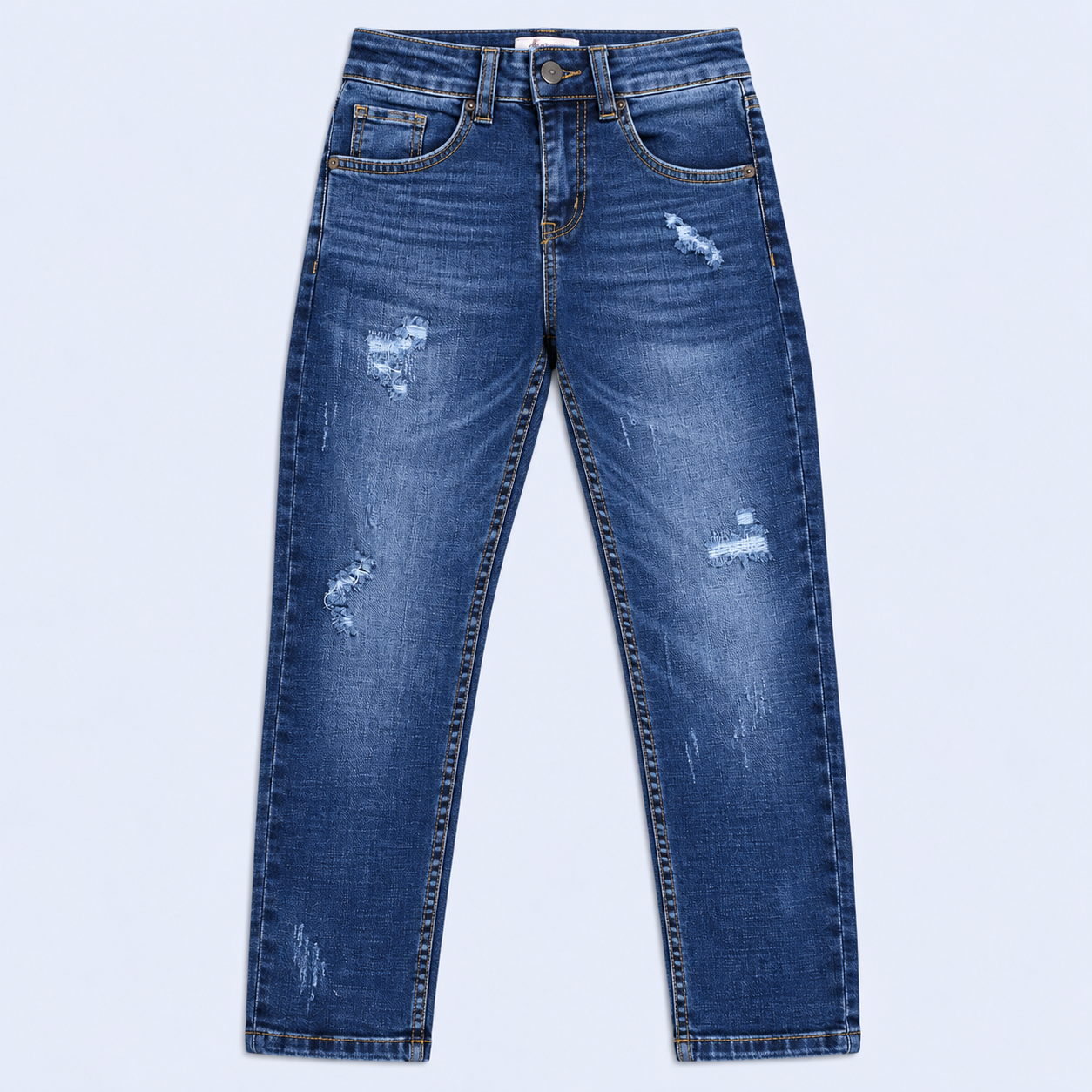 Jean niño skinny azul con desgaste