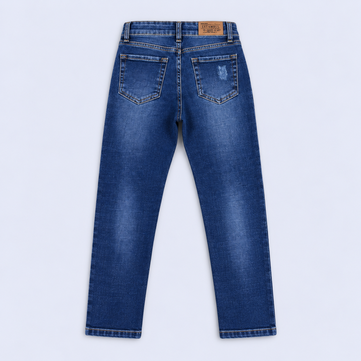 Jean niño skinny azul con desgaste