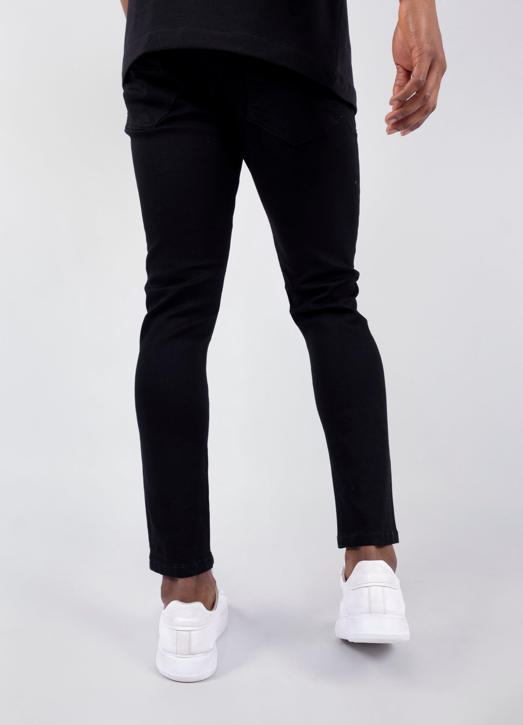 Jean hombre Skinny negro roto rodilla