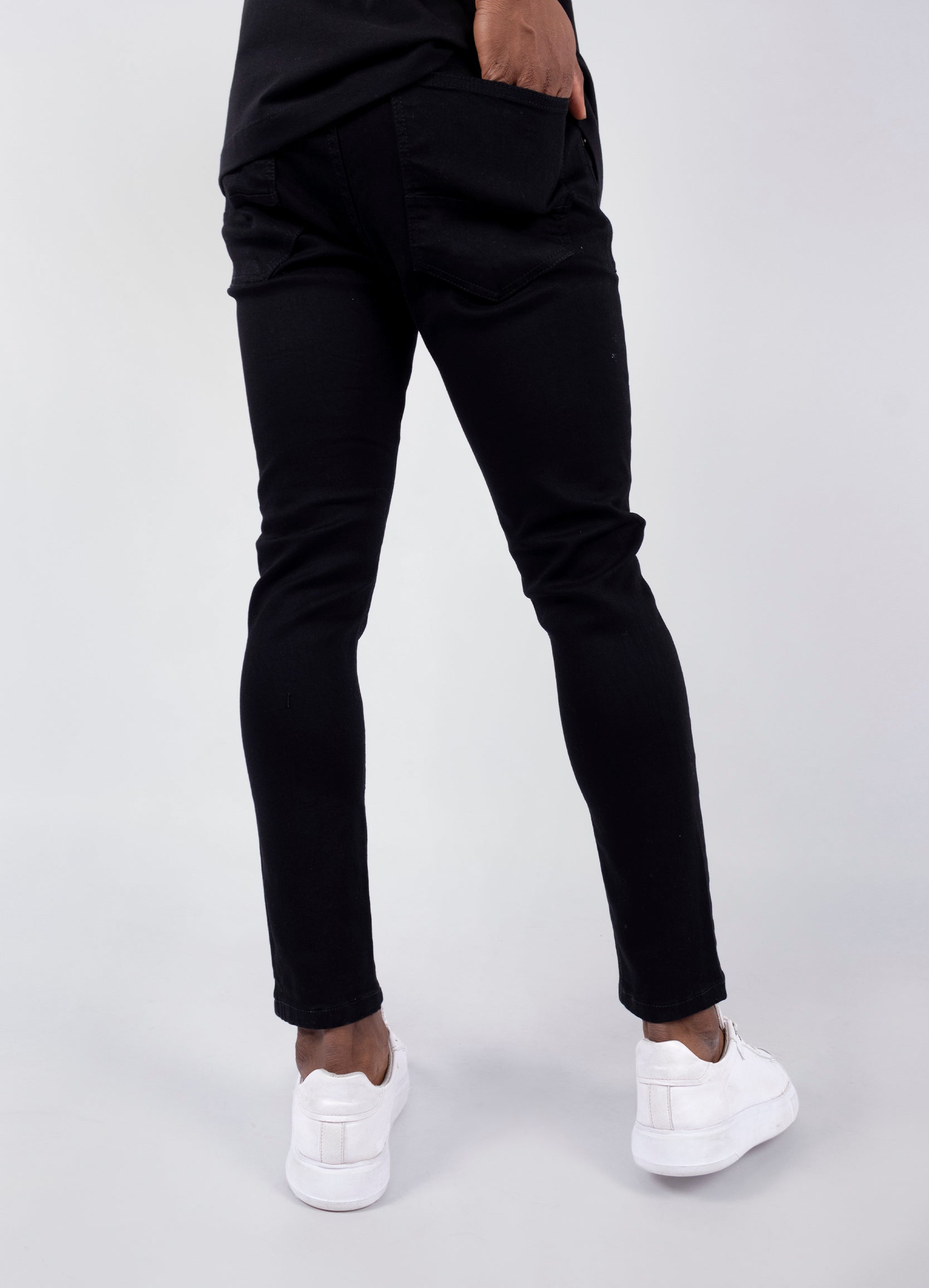 Jean hombre Skinny negro roto rodilla