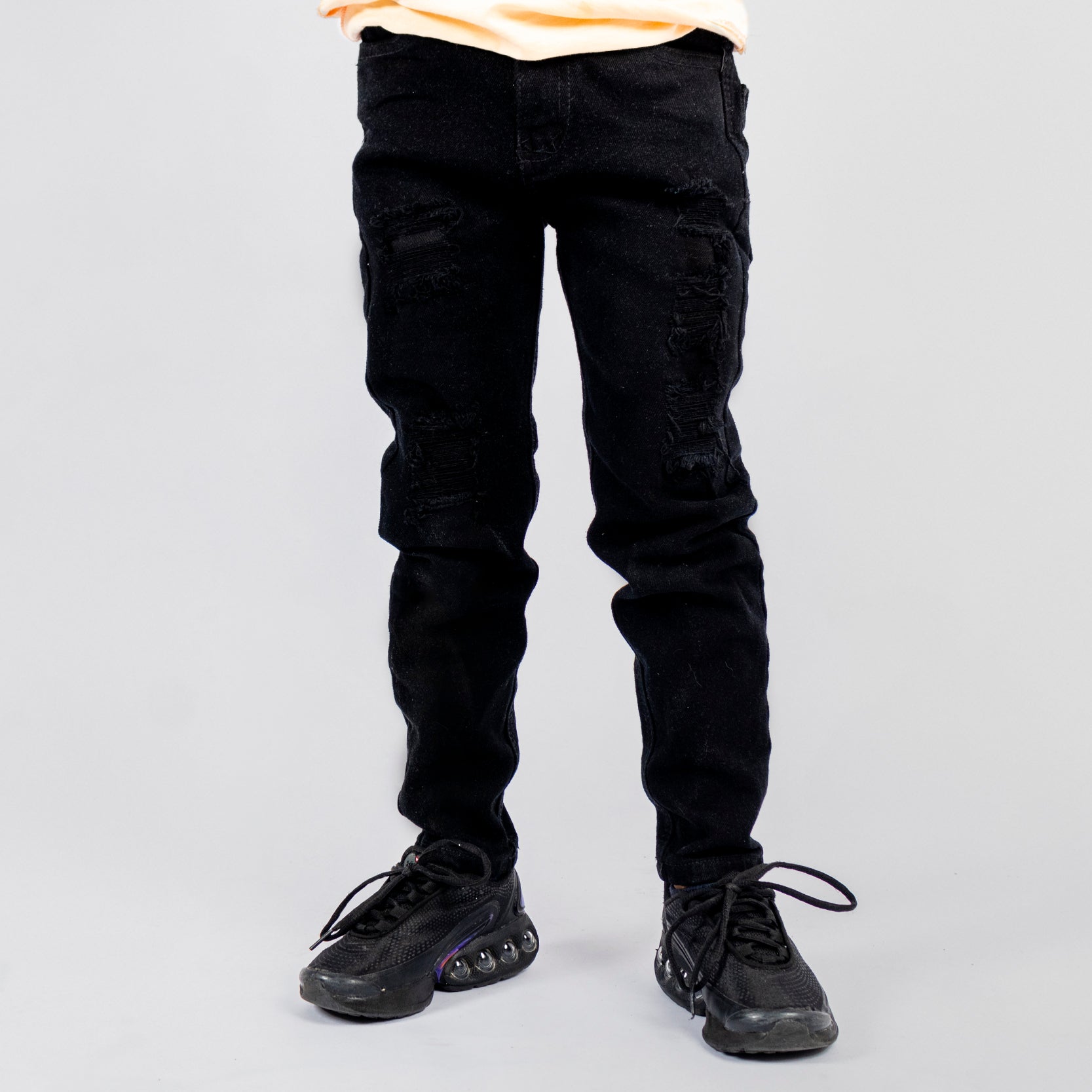 Jean niño negro rotos