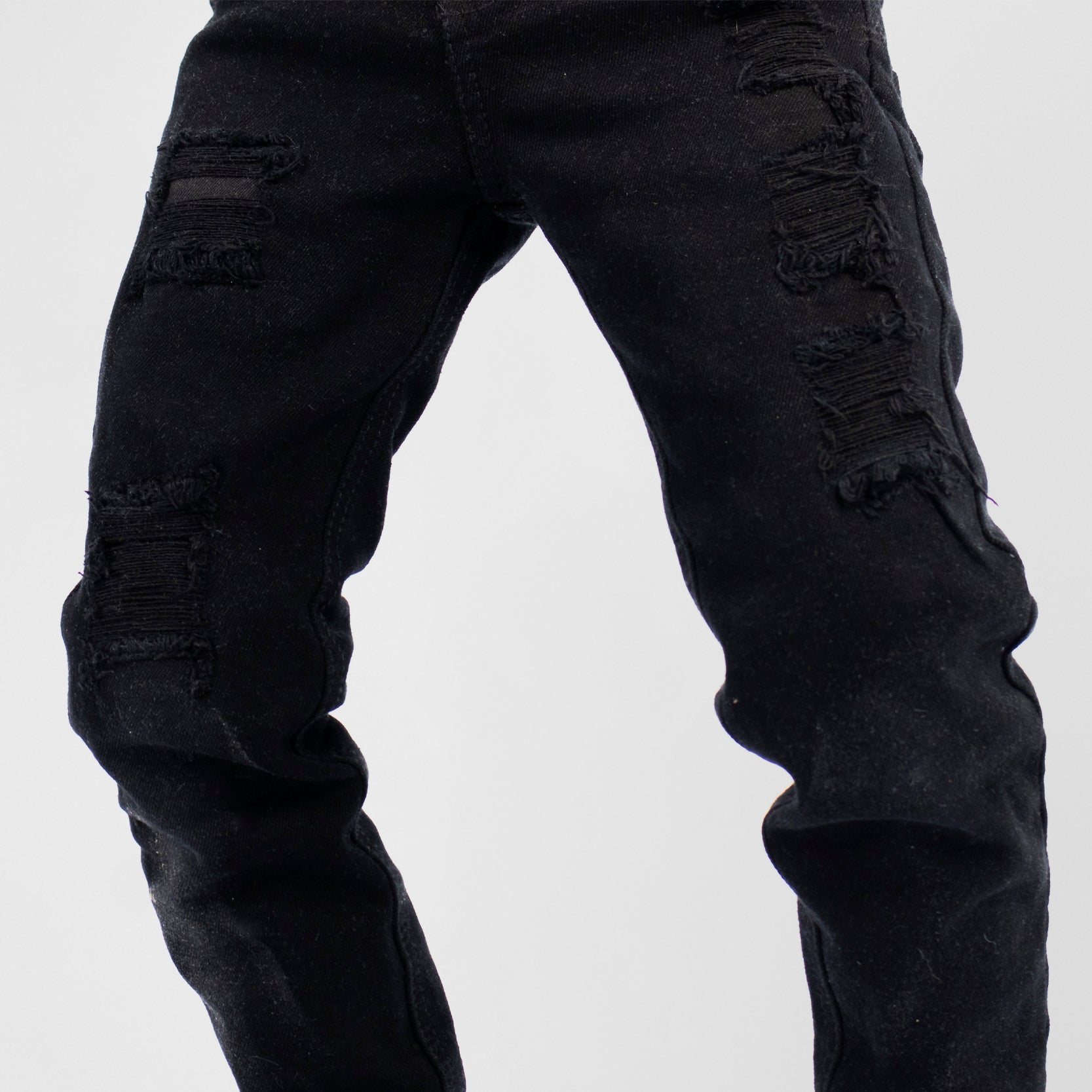 Jean niño negro rotos