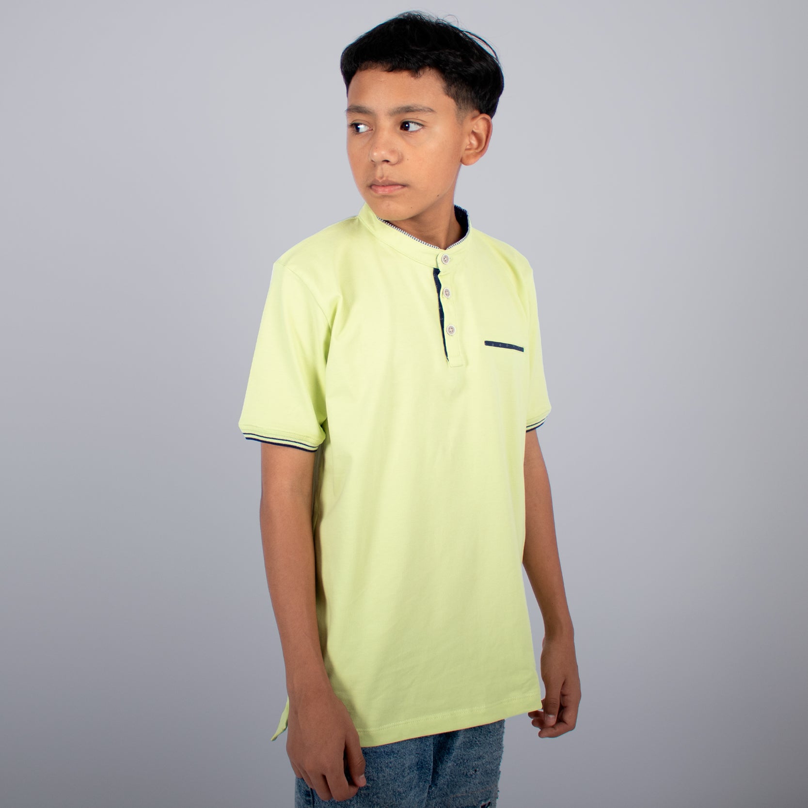 Polo niño cuello neru pistacho