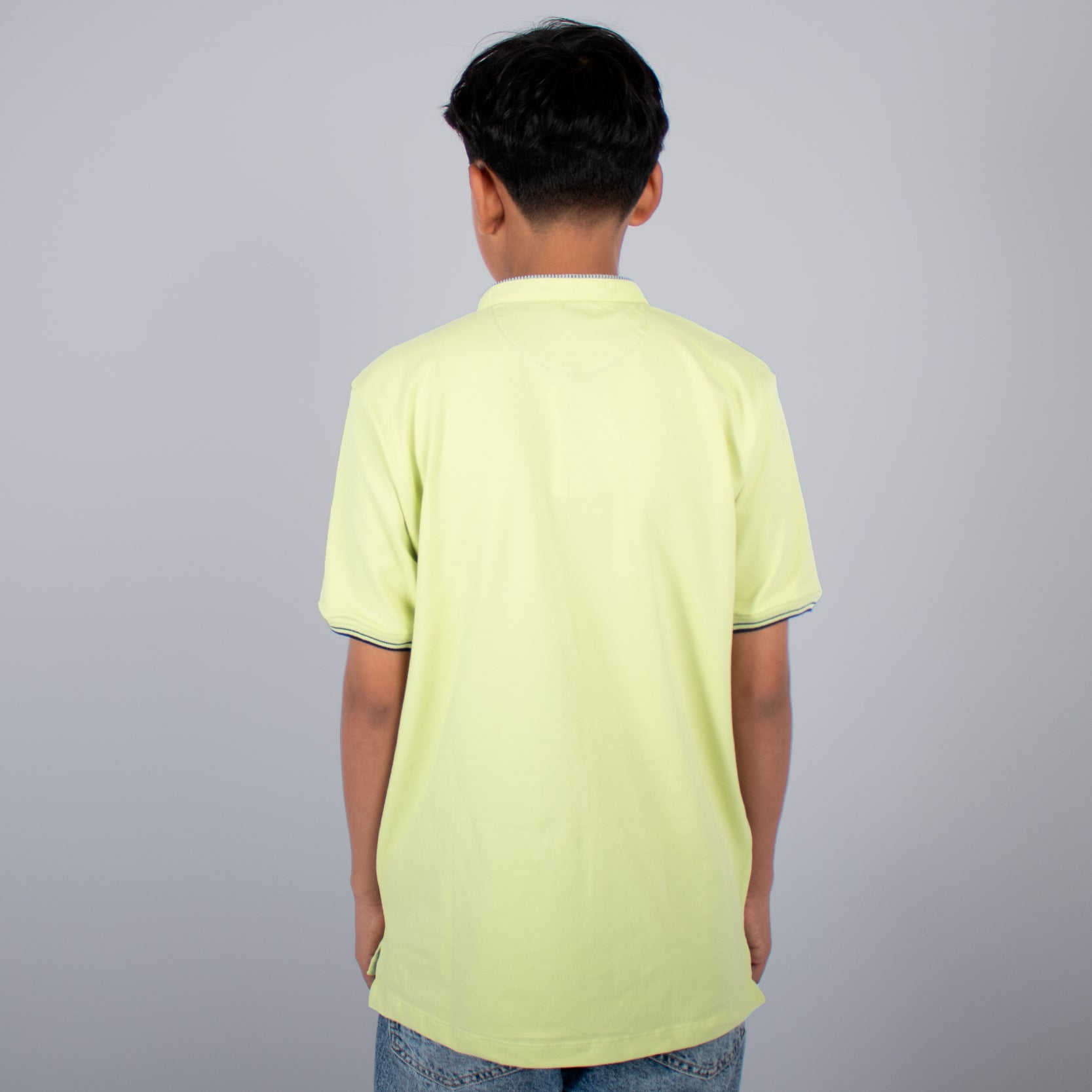 Polo niño cuello neru pistacho