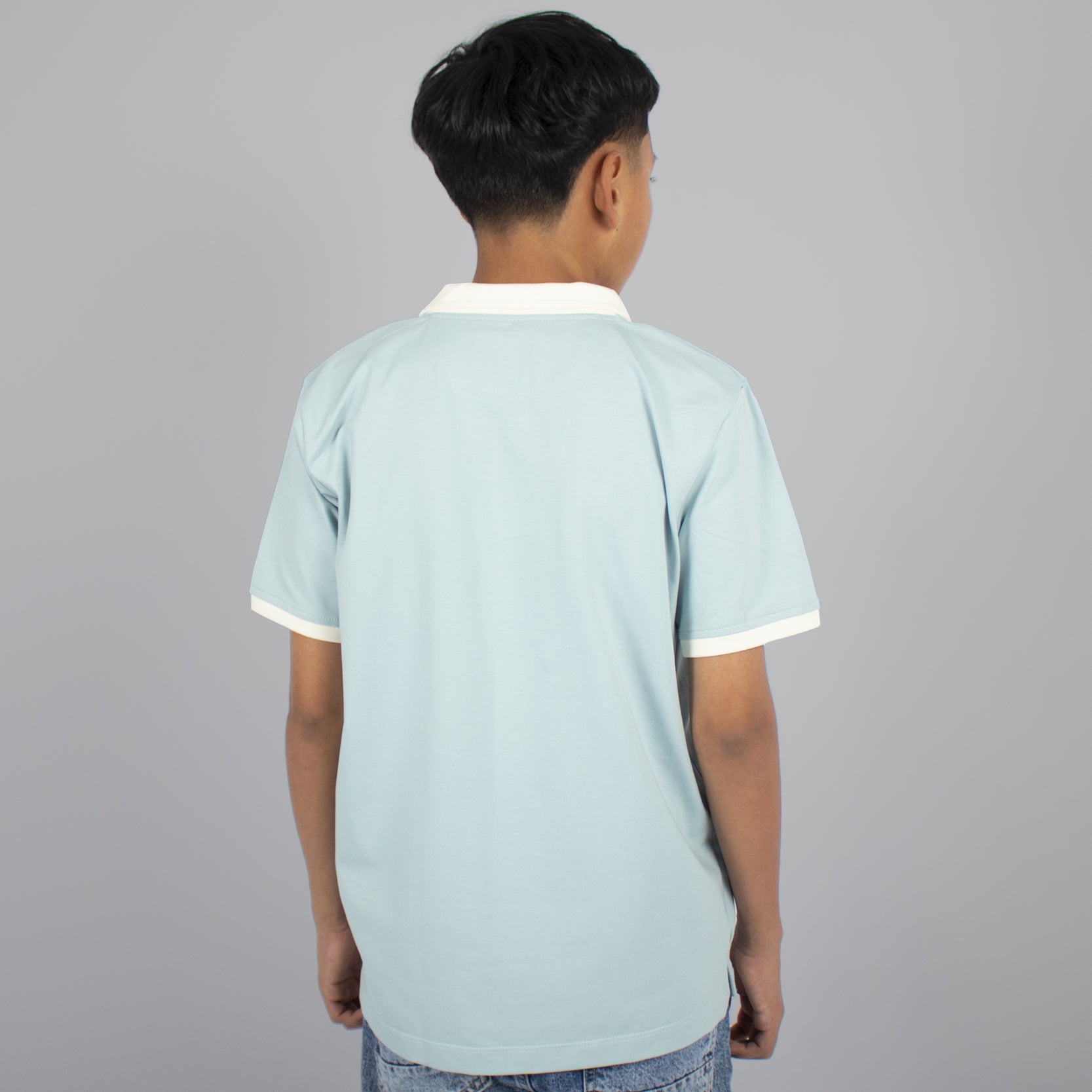 Polo niño cuello verde agua