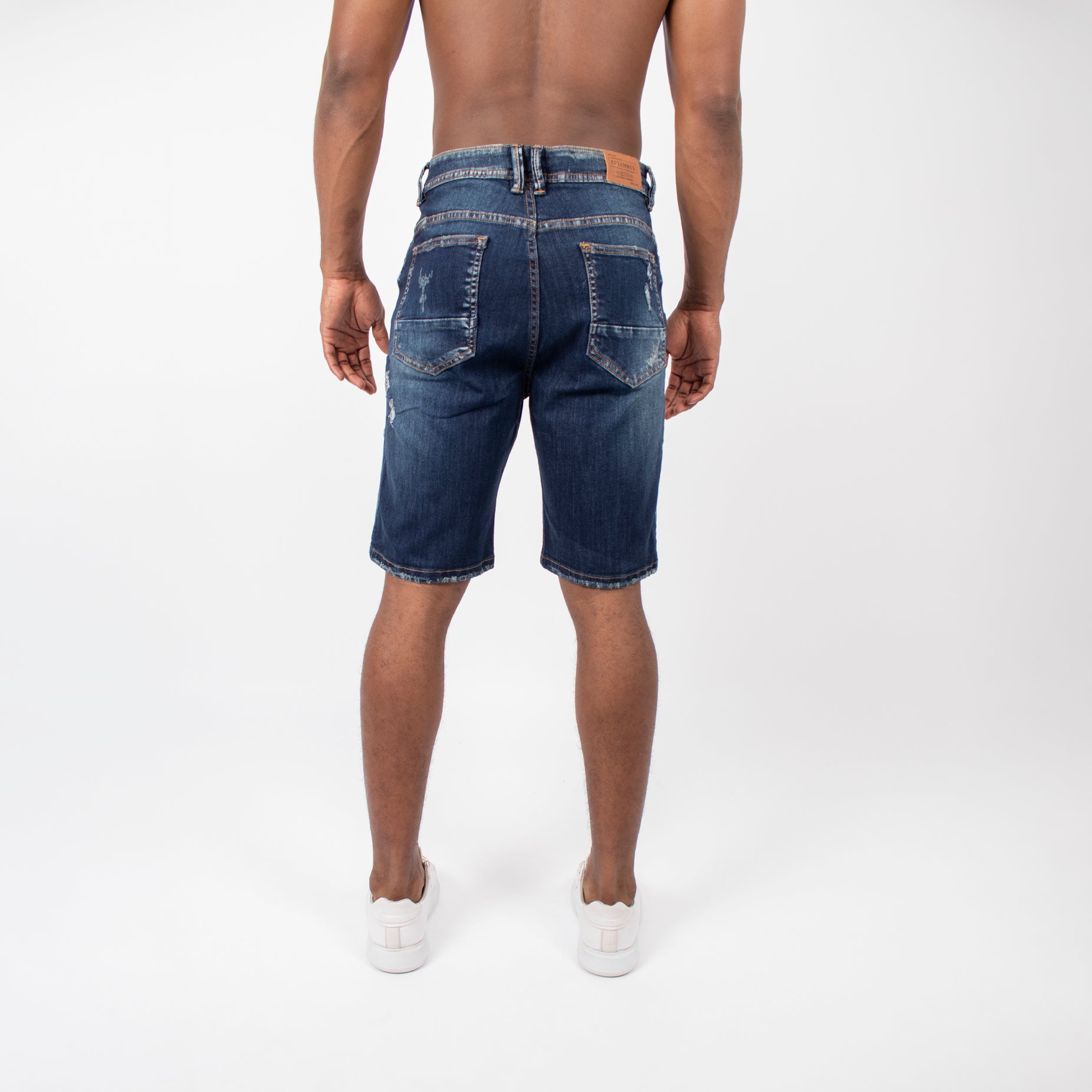 Bermuda hombre desgaste y rotos