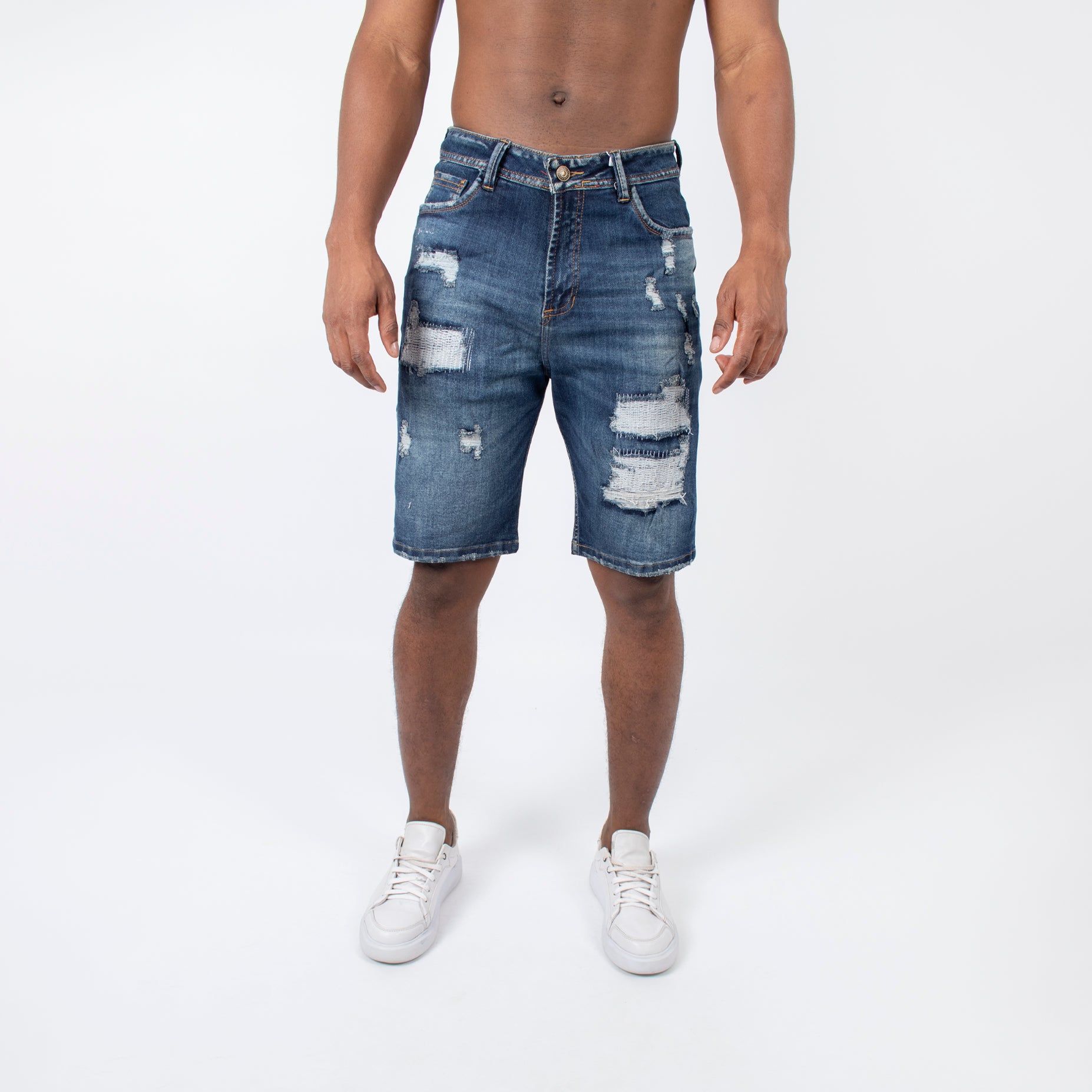 Bermuda hombre desgaste y rotos