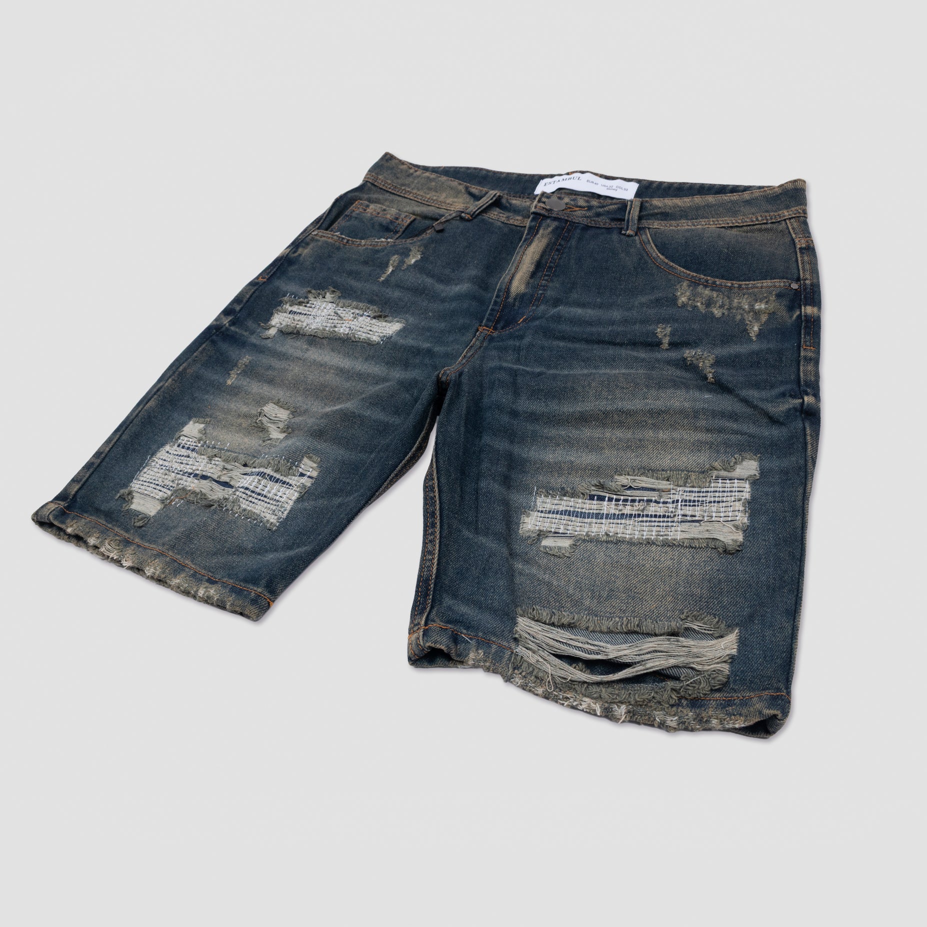 Bermuda hombre con rotos