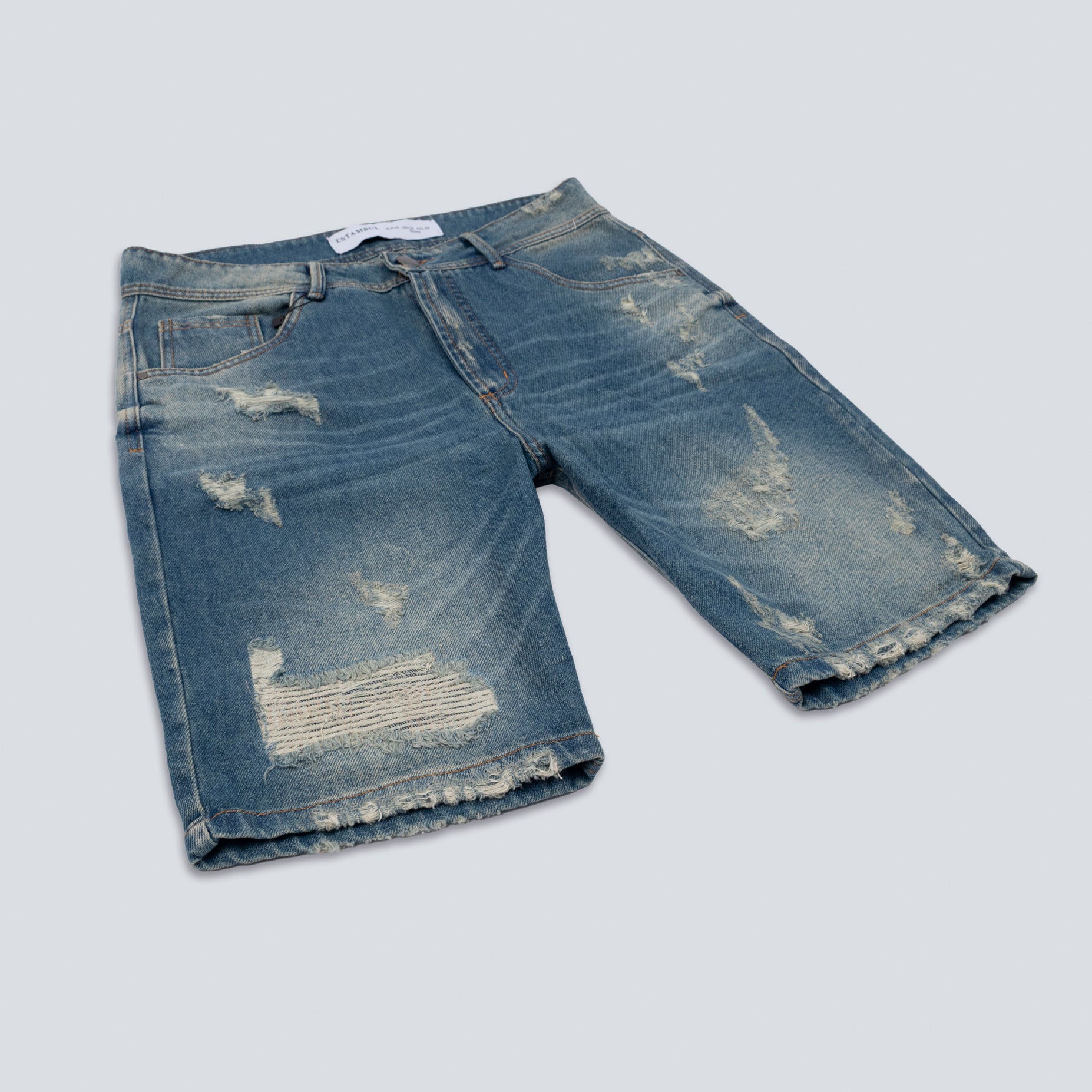 Bermuda hombre con rotos