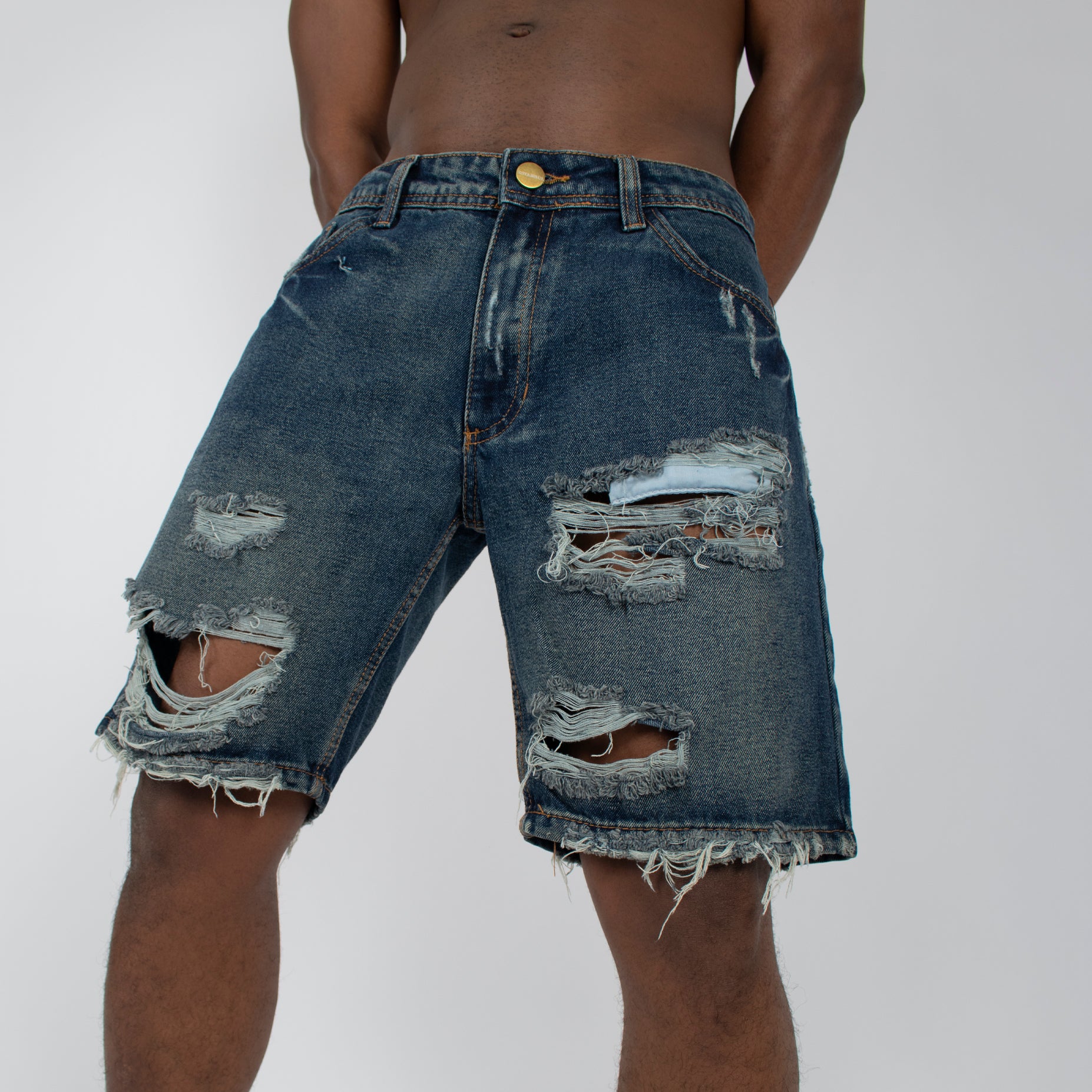 Bermuda hombre rotos