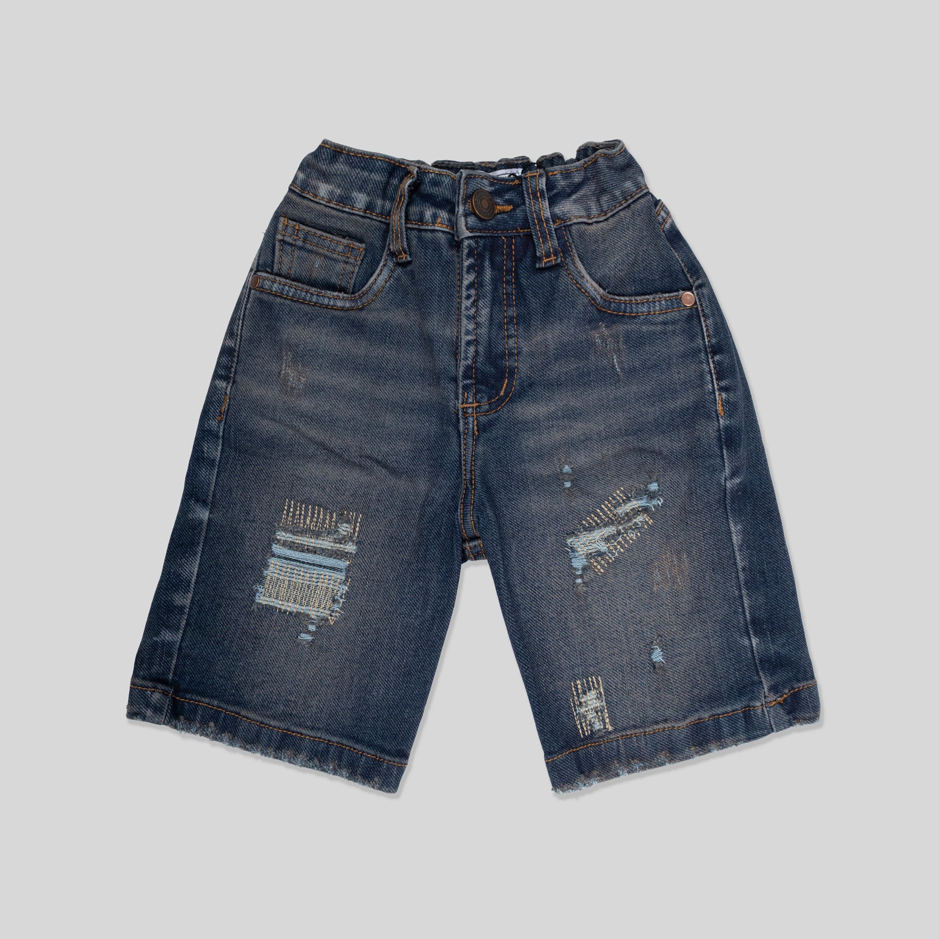 Bermuda niño con  rotos