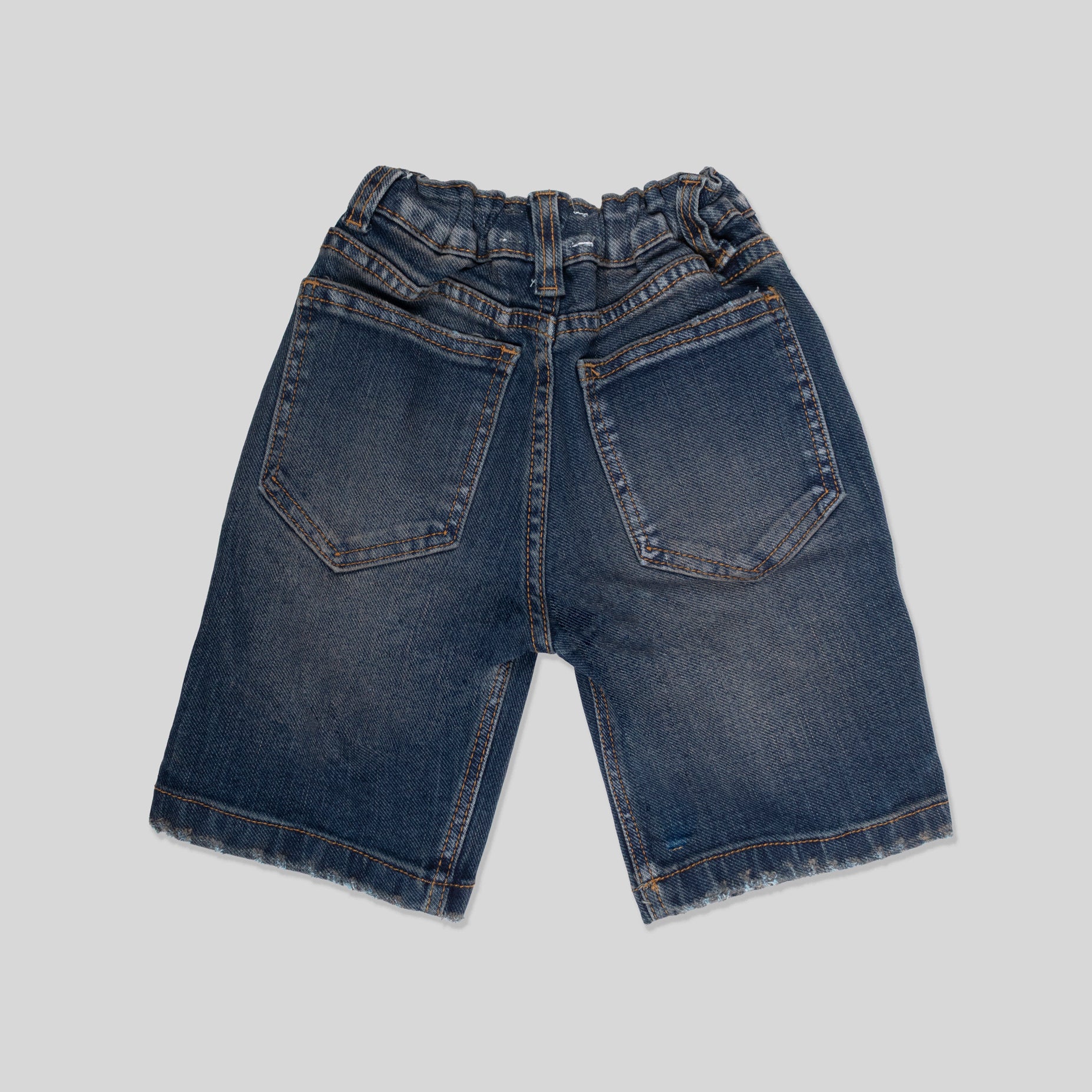 Bermuda niño con  rotos