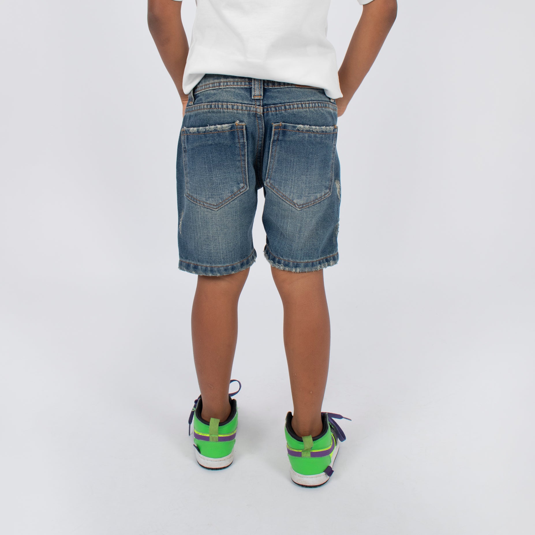 Bermuda niño desgaste