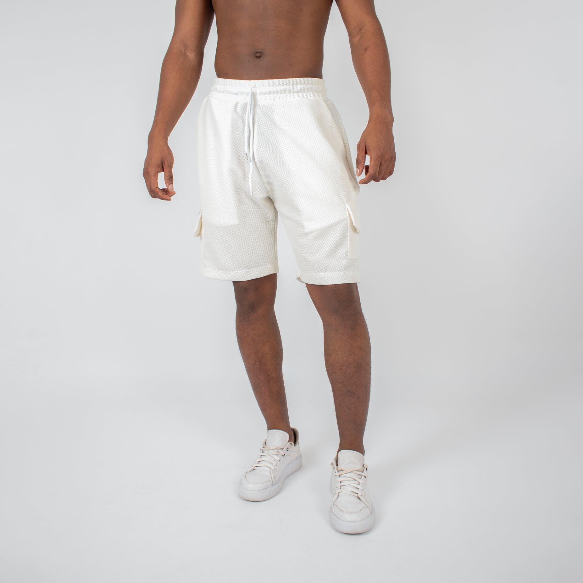 Pantaloneta hombre cargo textura marfil