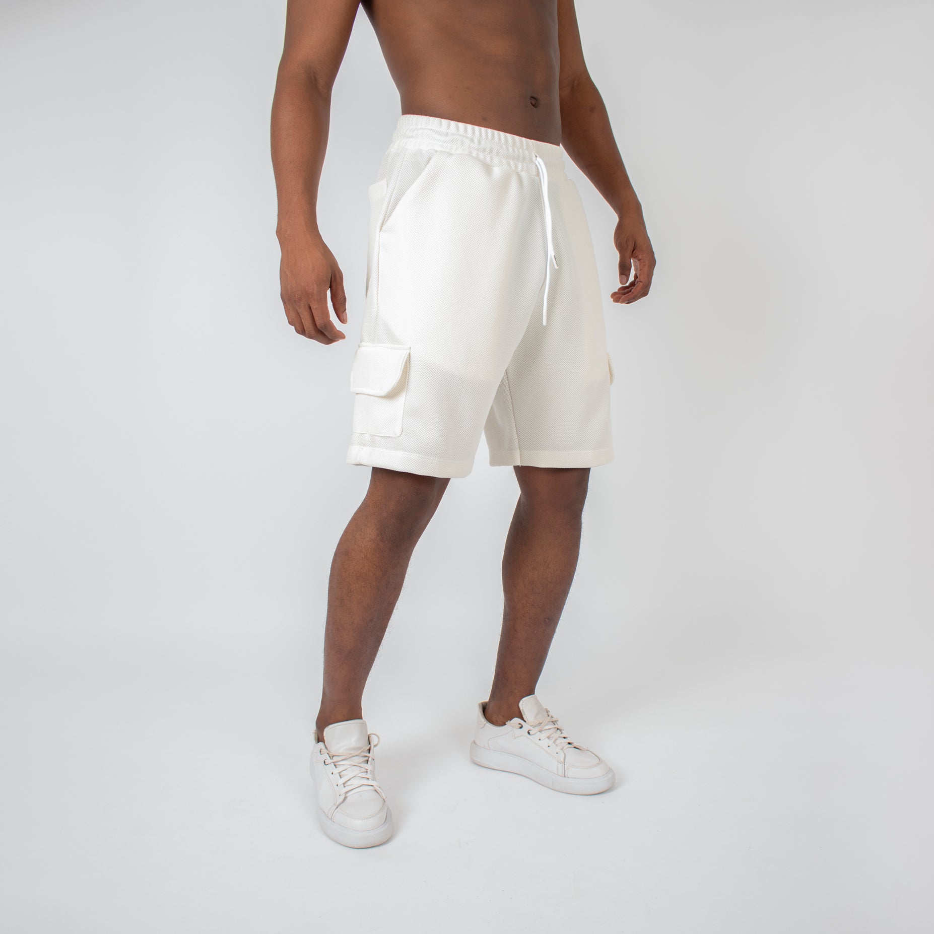 Pantaloneta hombre cargo textura marfil