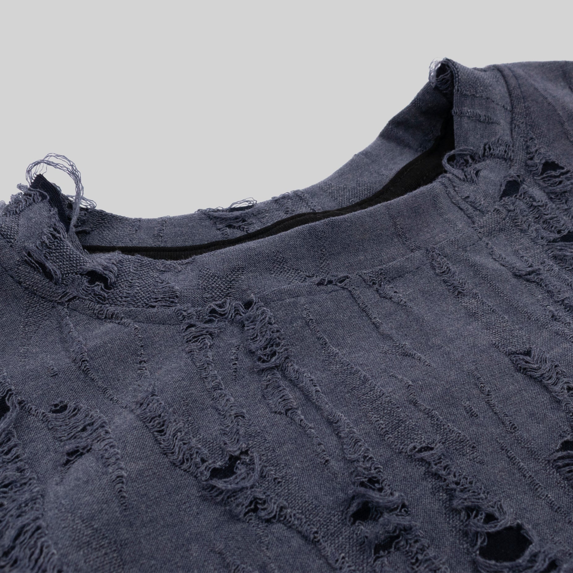 Oversize niño rotos morada