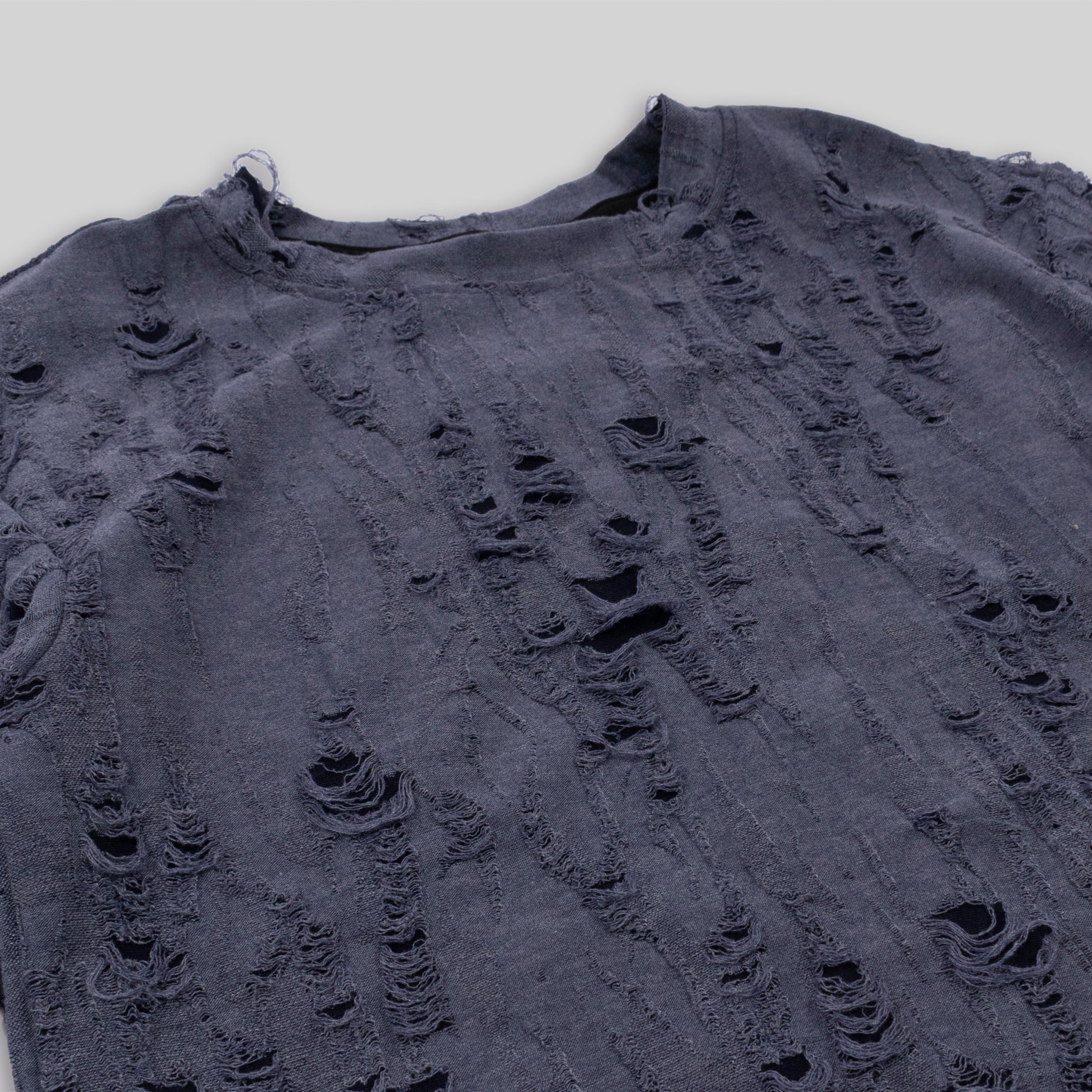 Oversize niño rotos morada