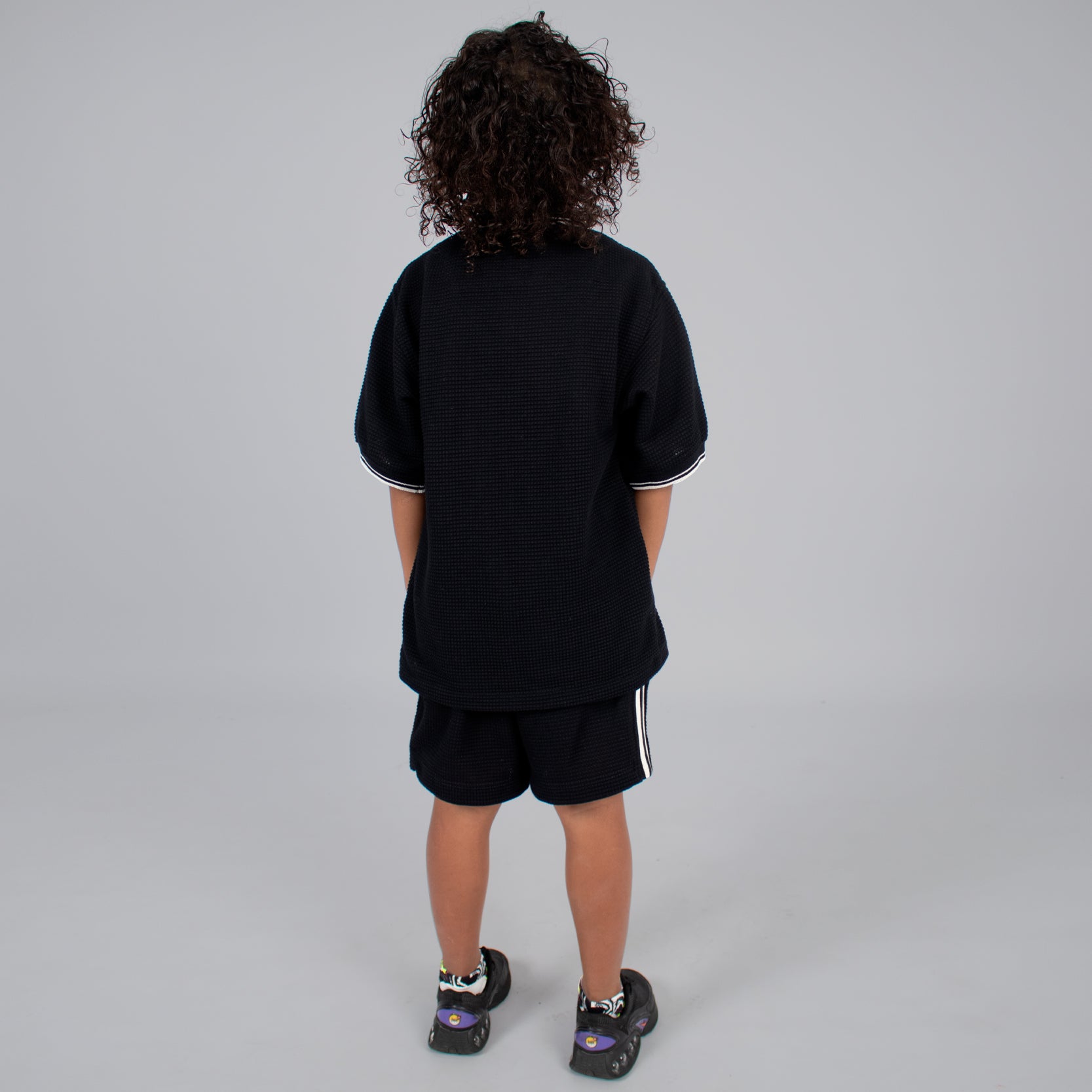 Conjunto niño textura negro