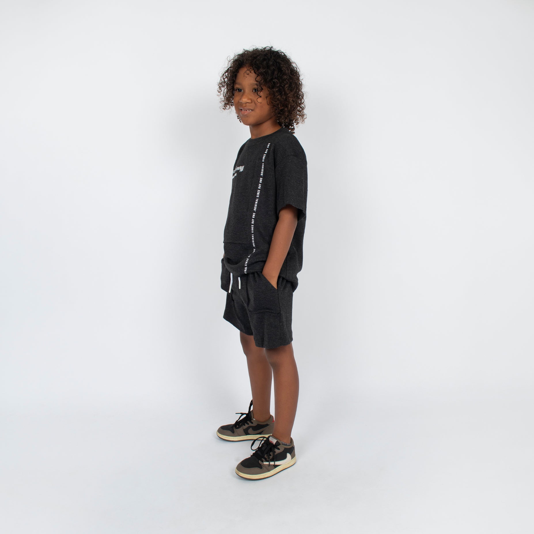 Conjunto niño textura gamuza negro