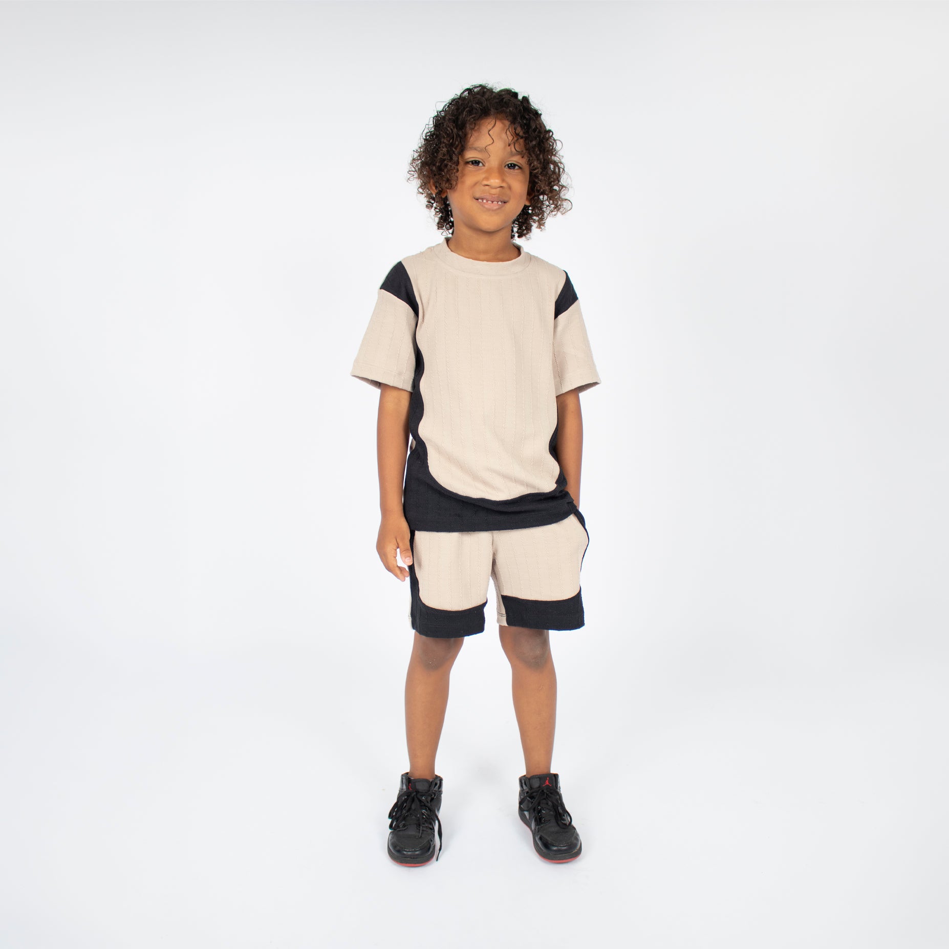 Conjunto niño textura camel con negro