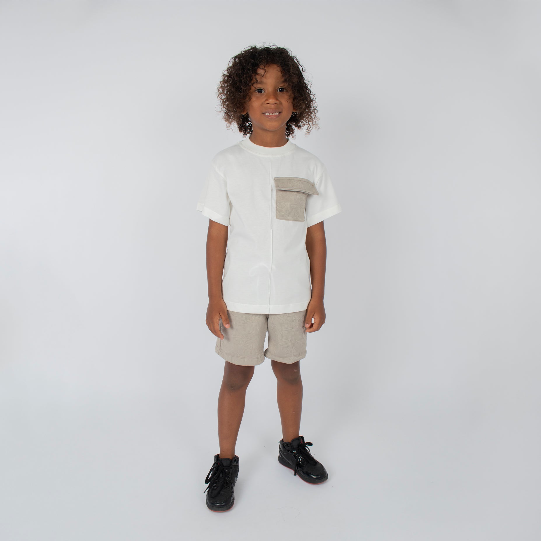 Conjunto niño clasico letras arena