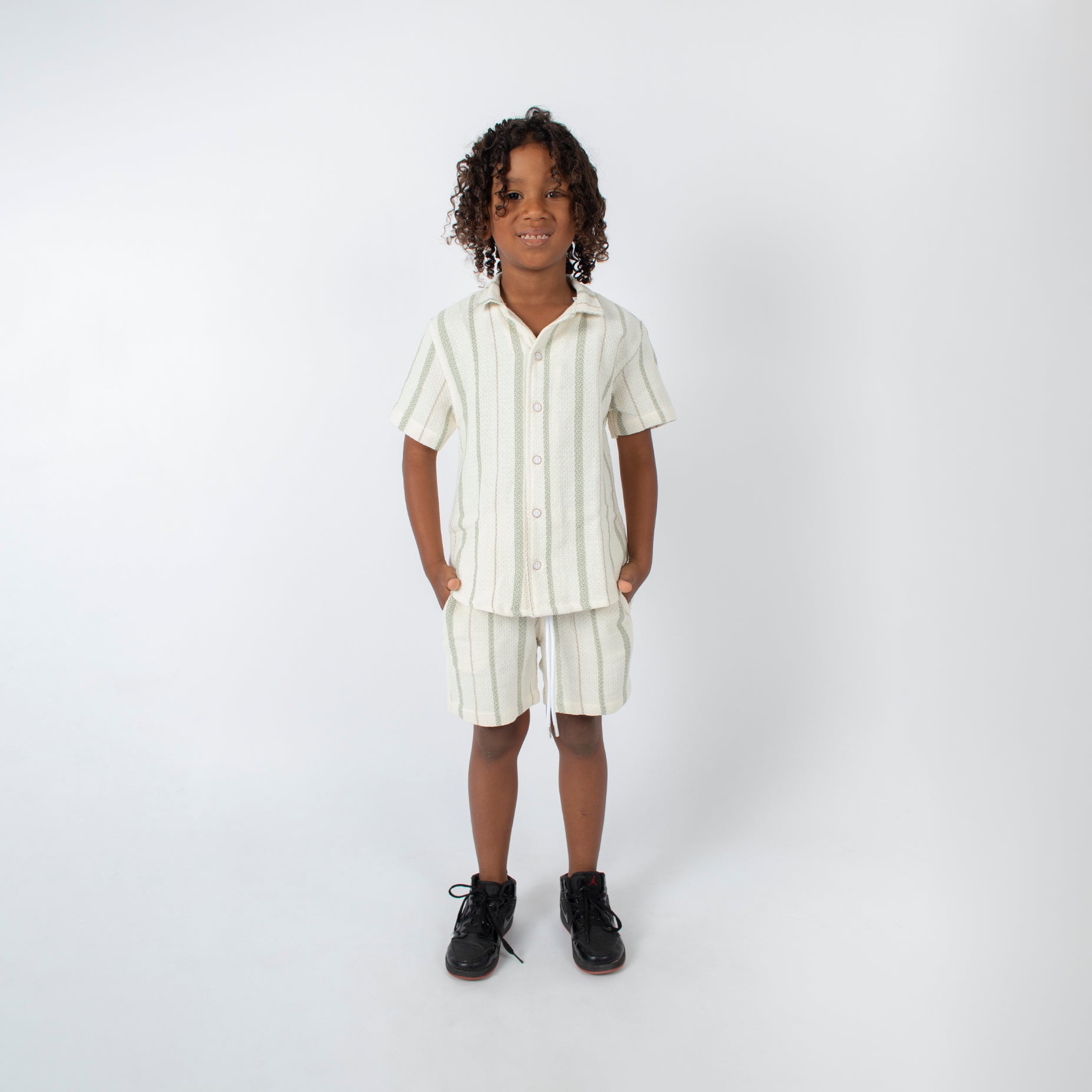 Conjunto niño textura verde