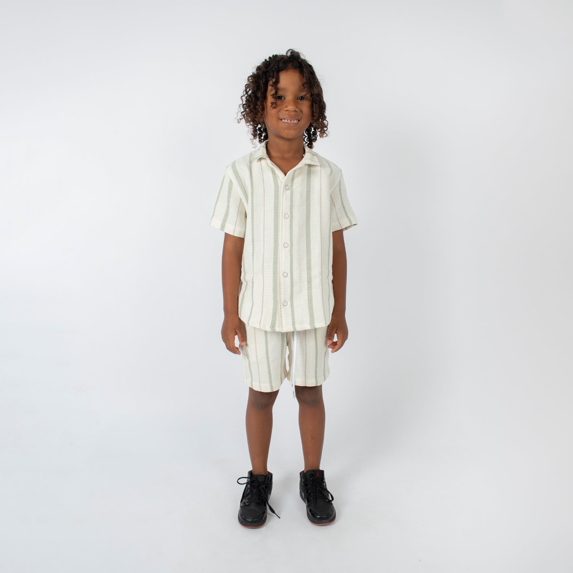 Conjunto niño textura verde