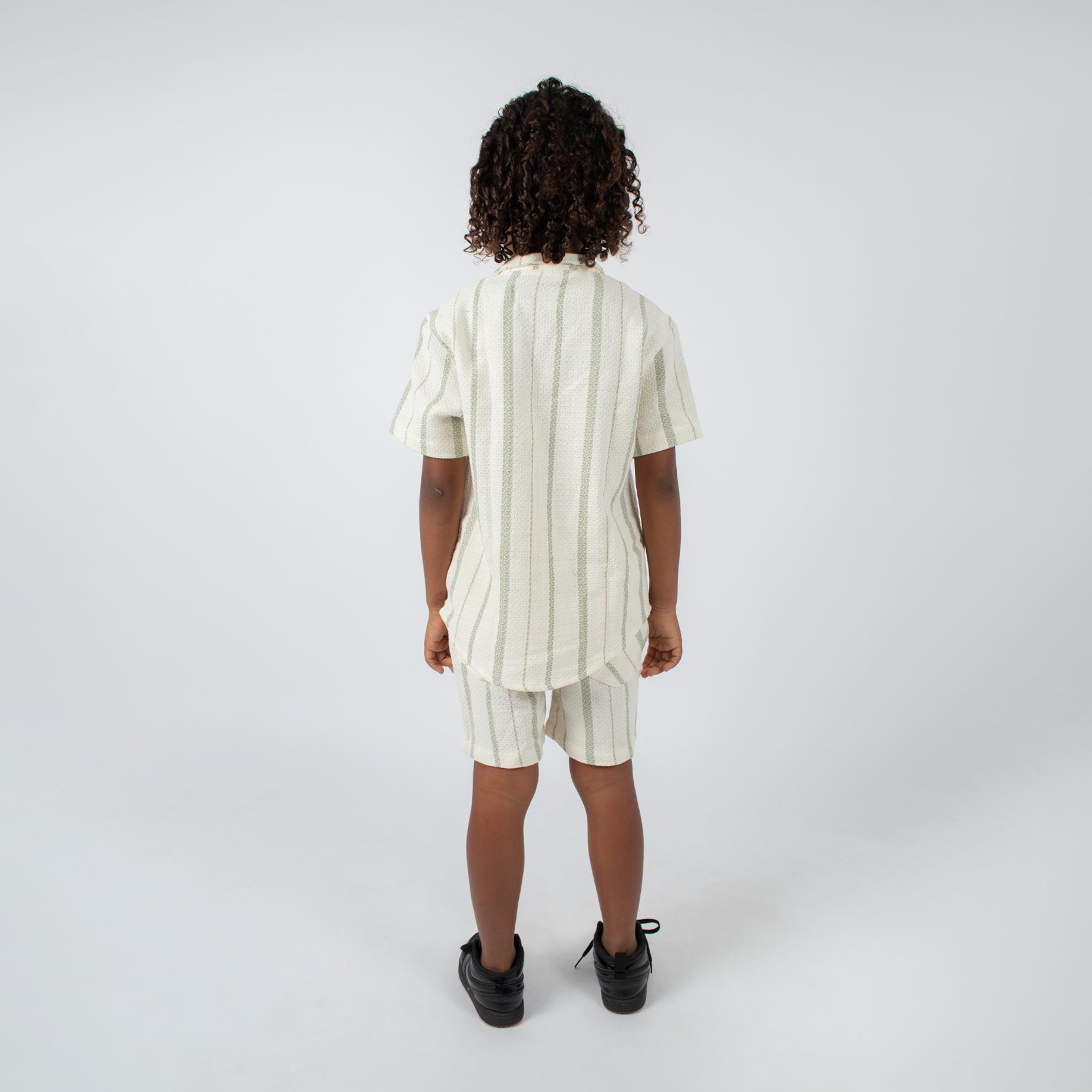 Conjunto niño textura verde