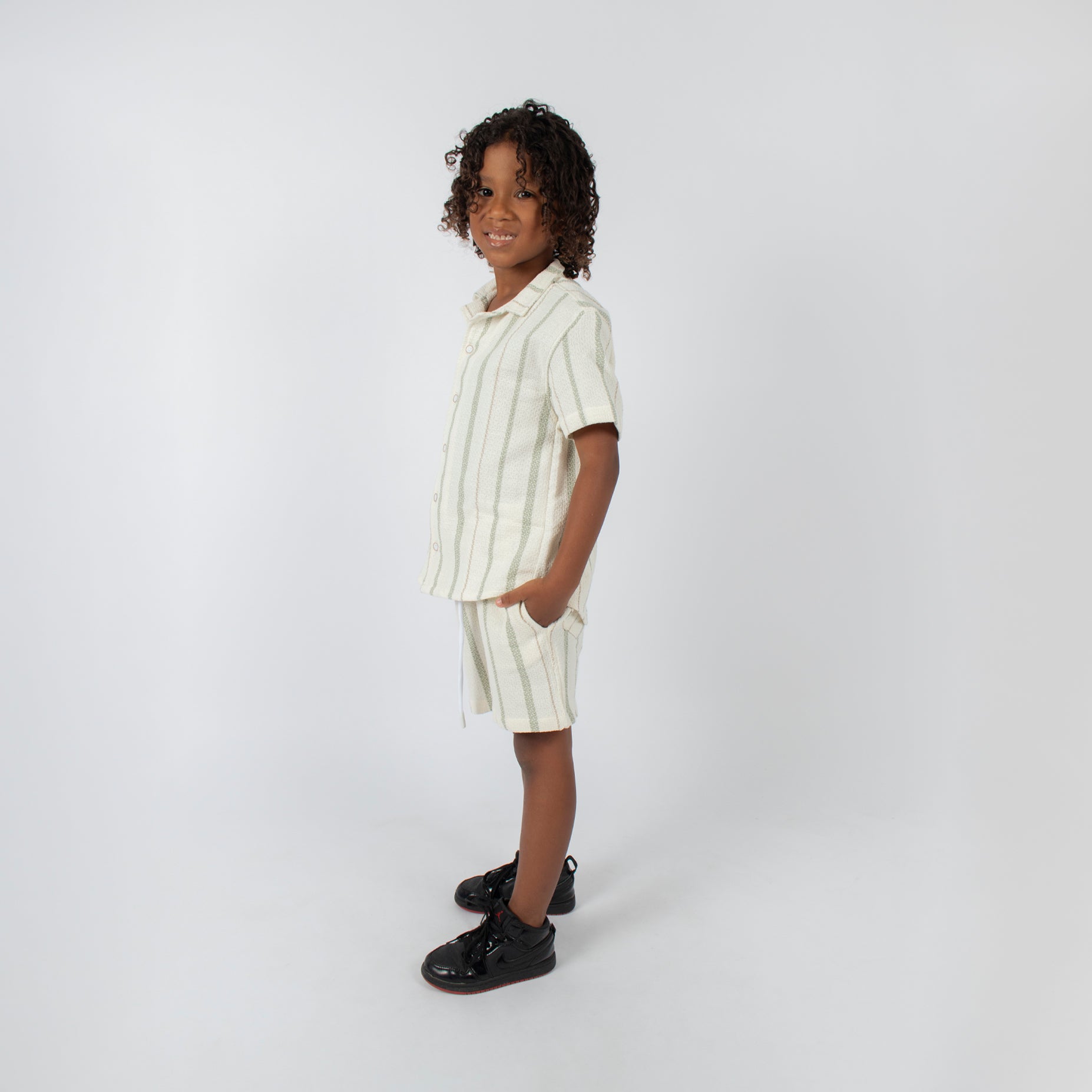 Conjunto niño textura verde